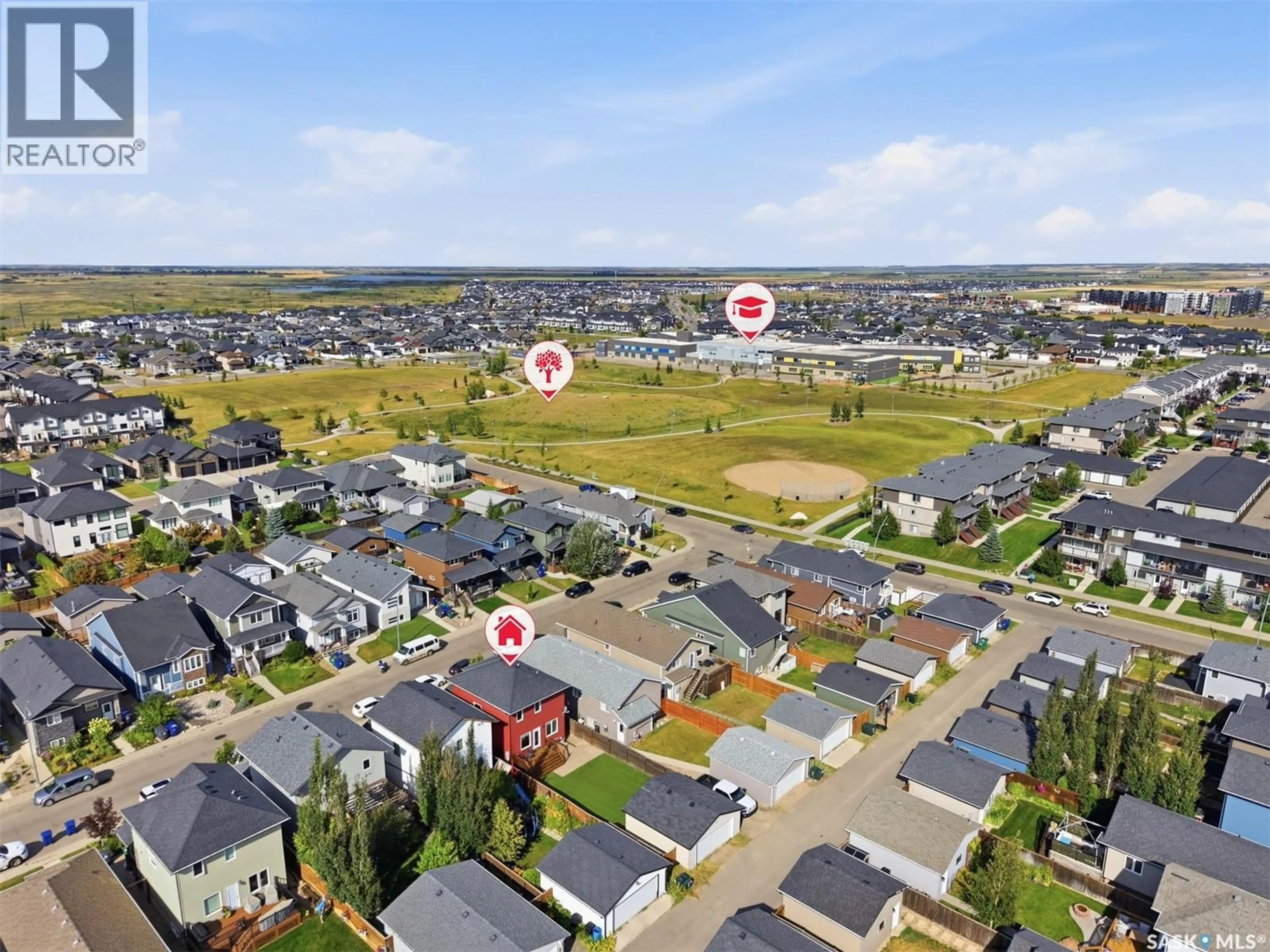 A pic from outside/outdoor area/front of a property/back of a property/a pic from drone, street for 275 WYANT LANE, Saskatoon Saskatchewan S7W0L3