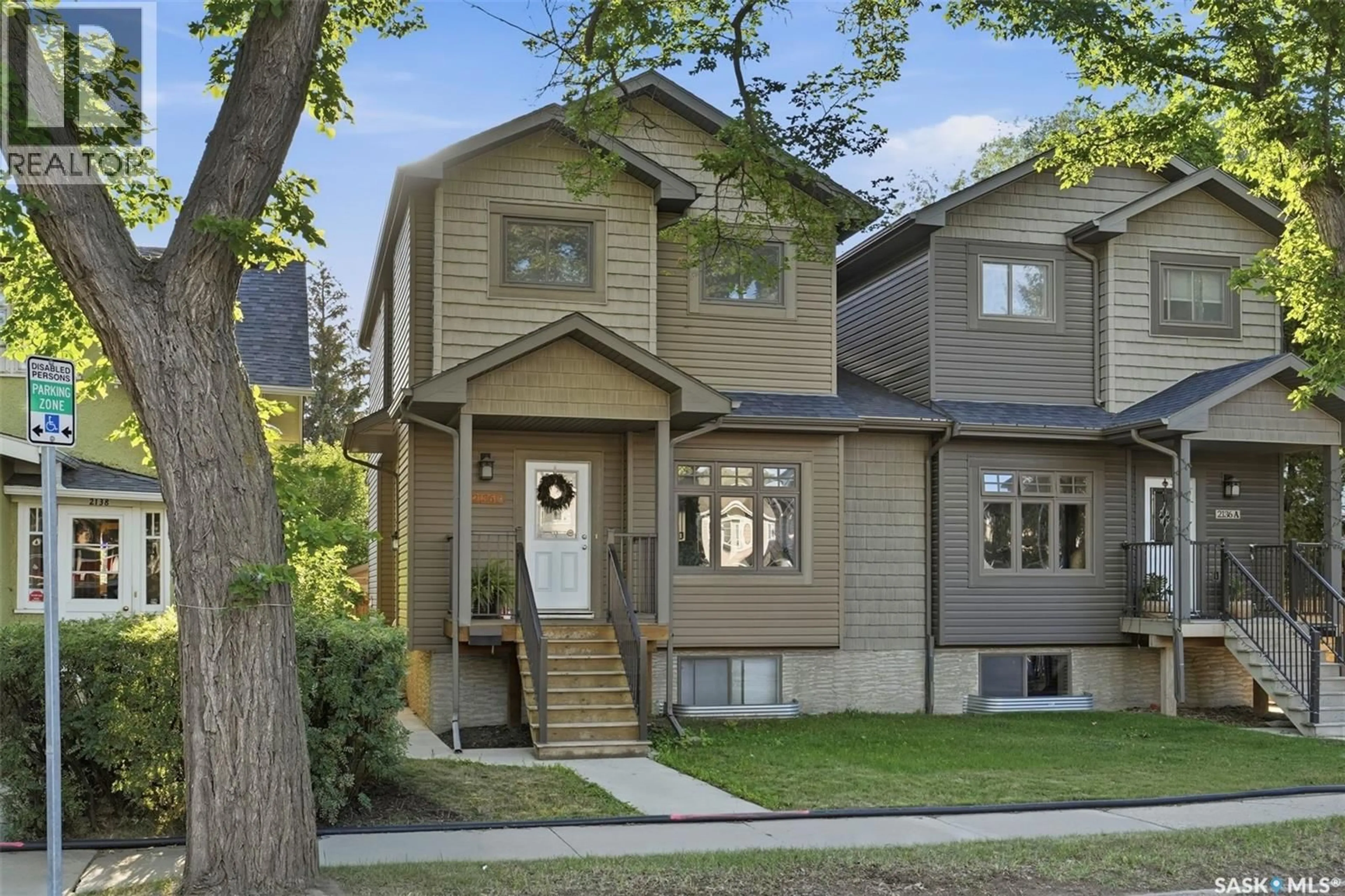 Home with vinyl exterior material, street for B - 2136 LORNE AVENUE, Saskatoon Saskatchewan S7J0R5