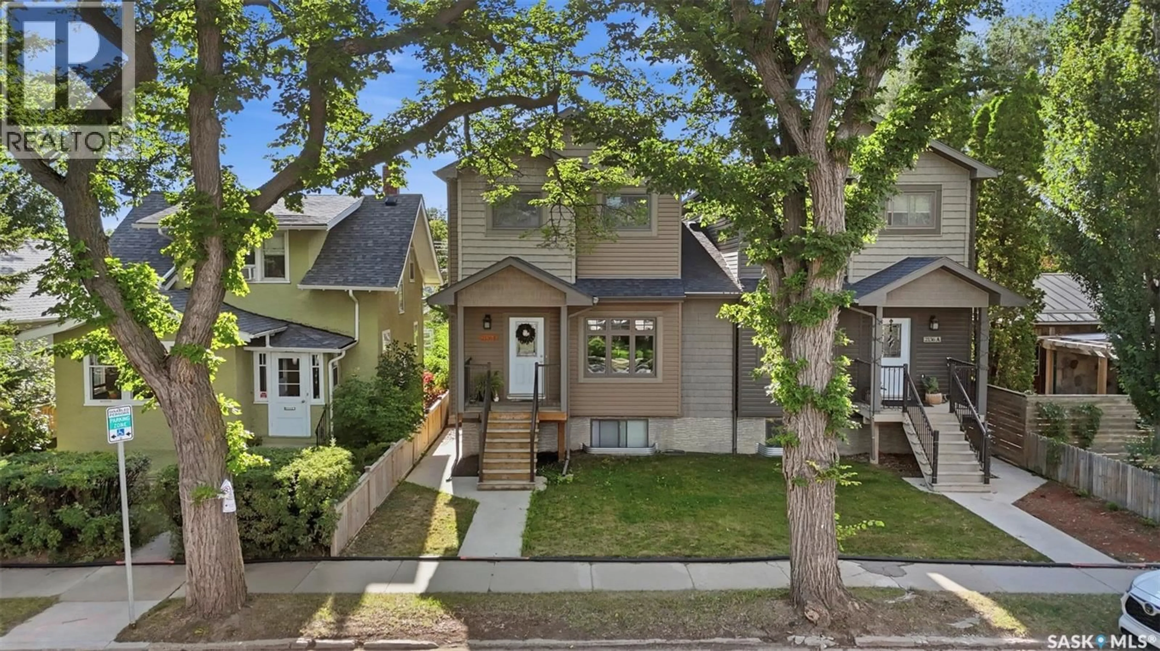 Home with vinyl exterior material, street for B - 2136 LORNE AVENUE, Saskatoon Saskatchewan S7J0R5