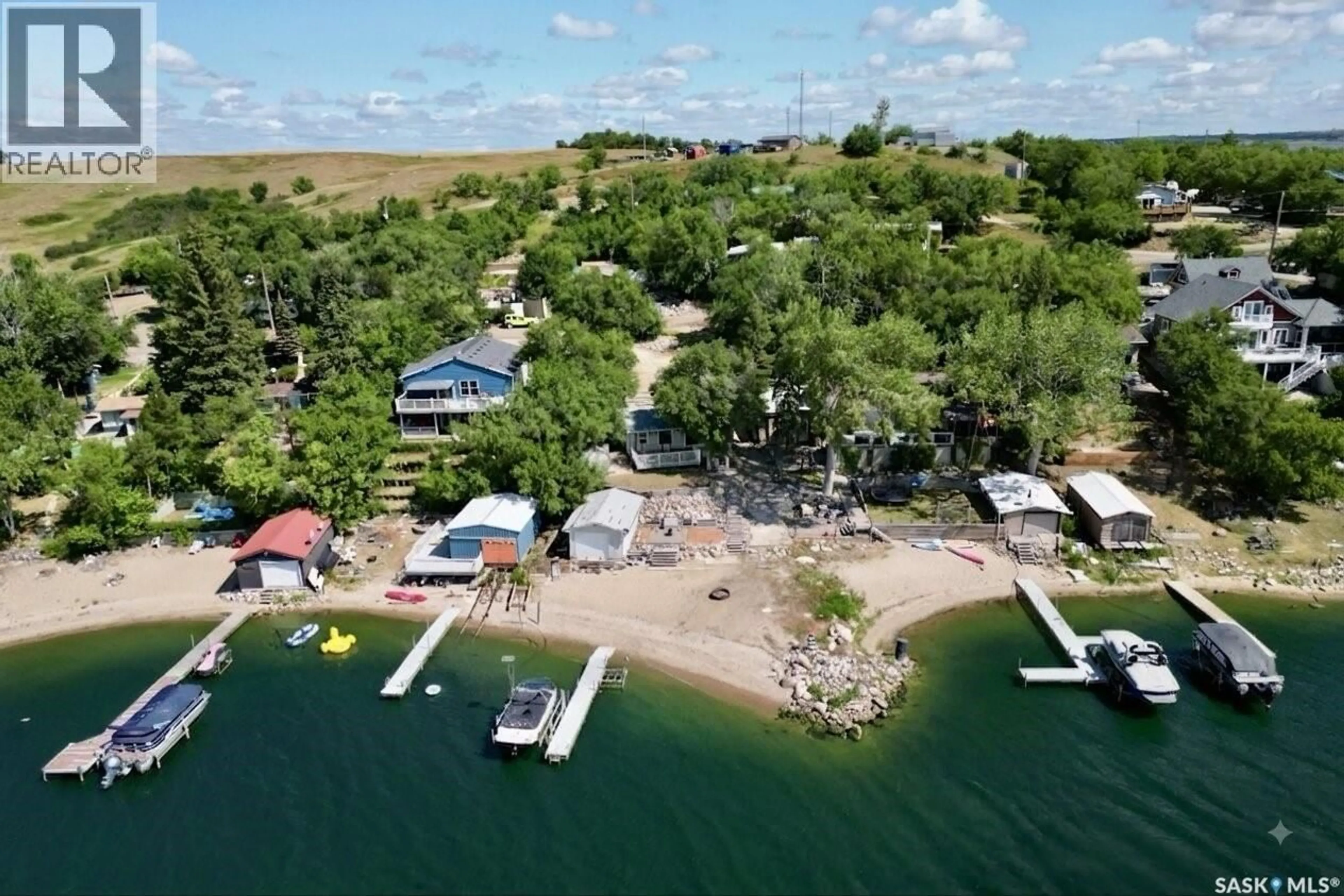 A pic from outside/outdoor area/front of a property/back of a property/a pic from drone, water/lake/river/ocean view for 65 PELICAN DRIVE, Pelican Pointe Saskatchewan S0G4L0