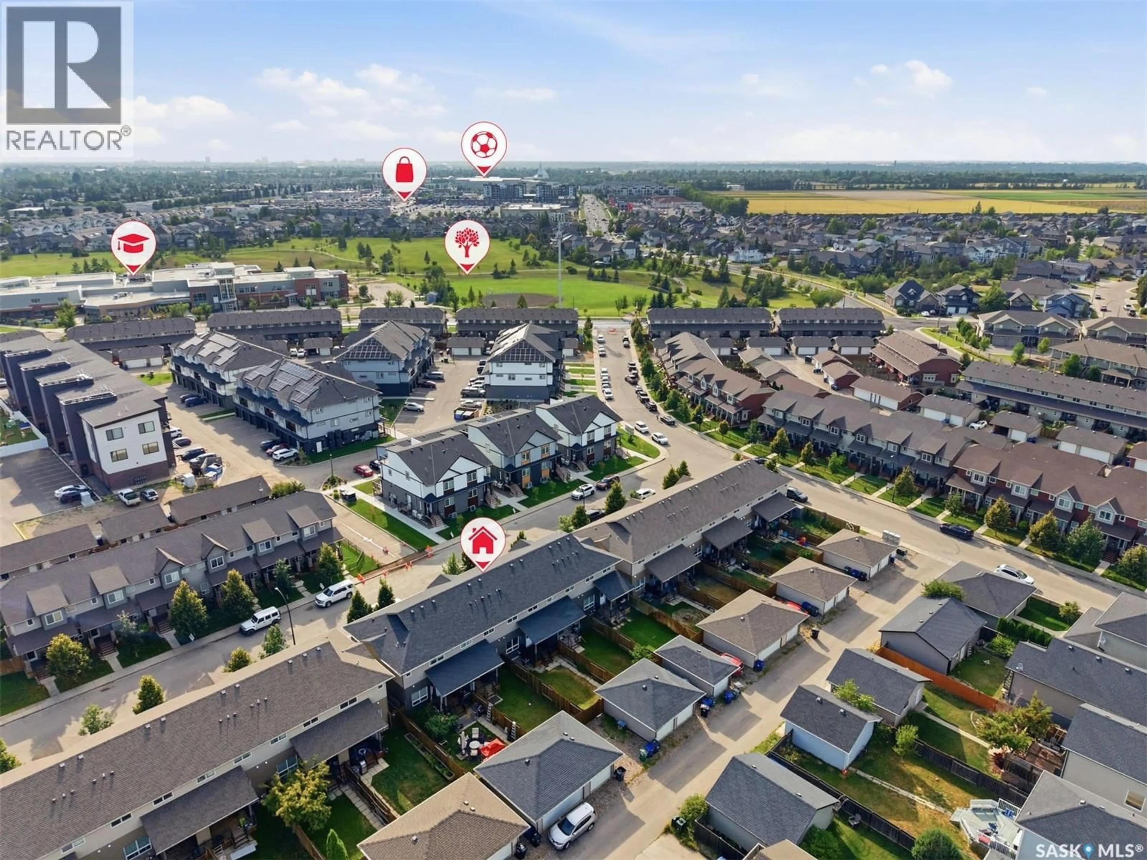 A pic from outside/outdoor area/front of a property/back of a property/a pic from drone, street for 360 WILLOWGROVE LANE, Saskatoon Saskatchewan S7W0H7