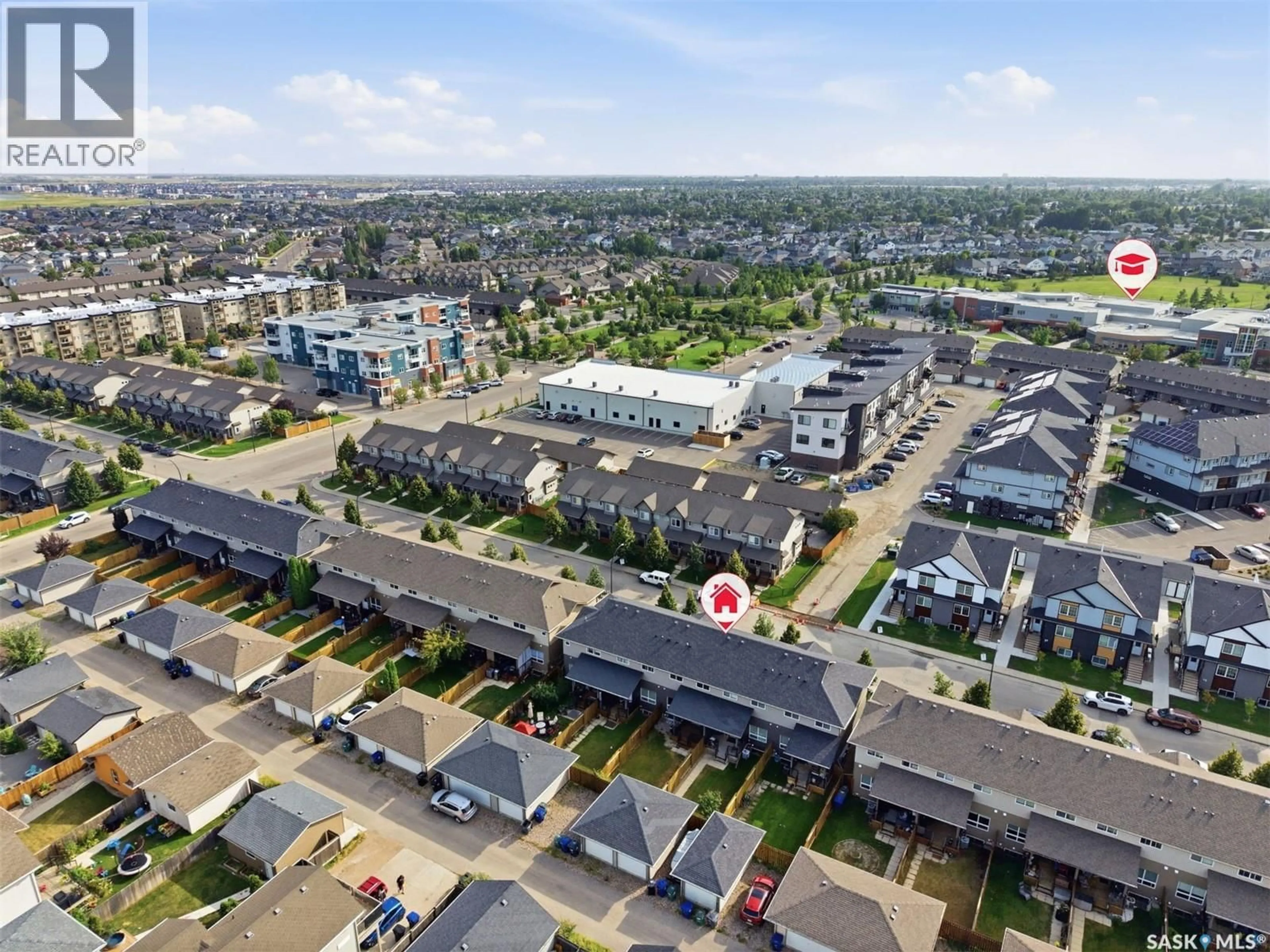 A pic from outside/outdoor area/front of a property/back of a property/a pic from drone, street for 360 WILLOWGROVE LANE, Saskatoon Saskatchewan S7W0H7