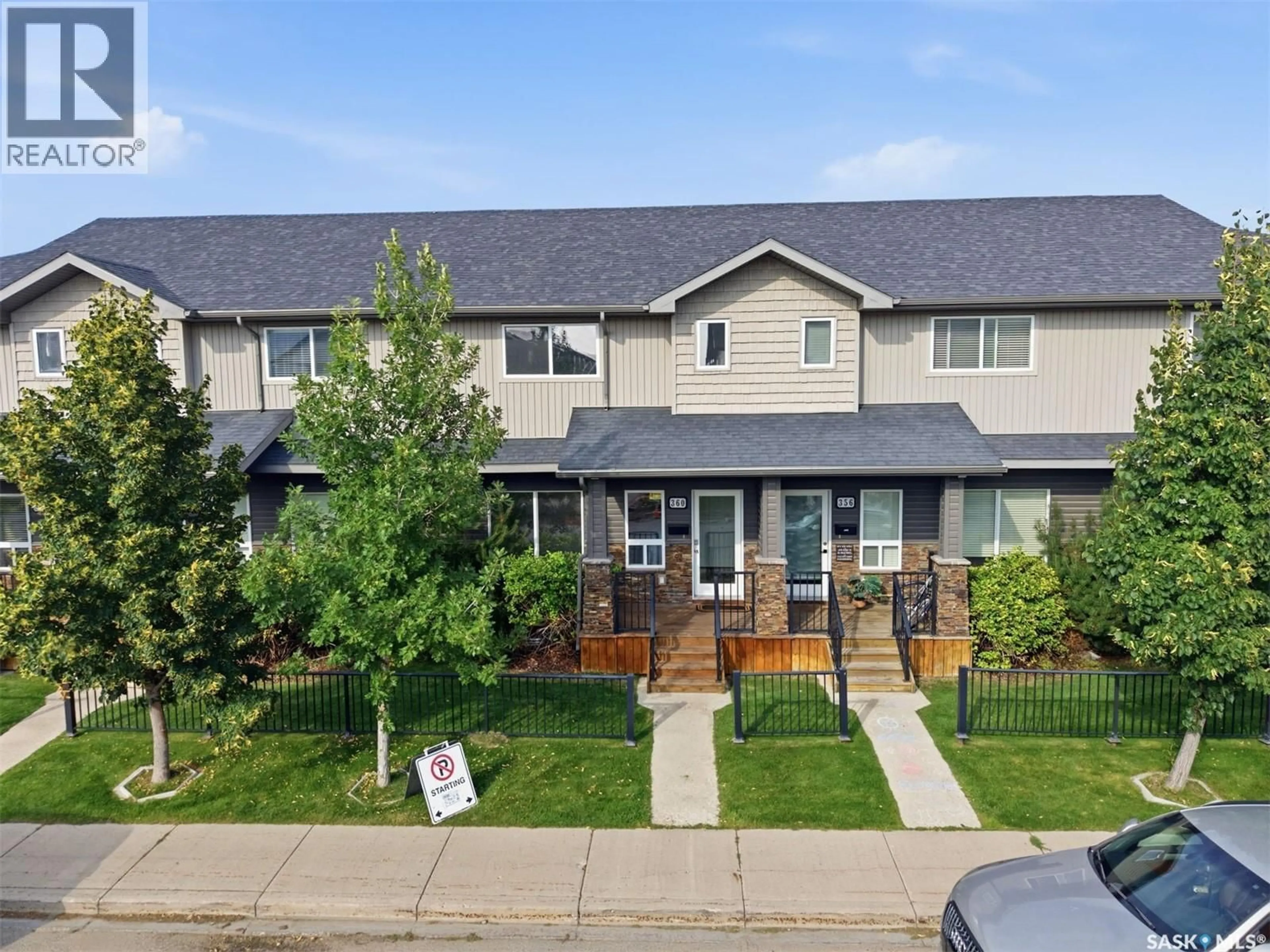 A pic from outside/outdoor area/front of a property/back of a property/a pic from drone, street for 360 WILLOWGROVE LANE, Saskatoon Saskatchewan S7W0H7