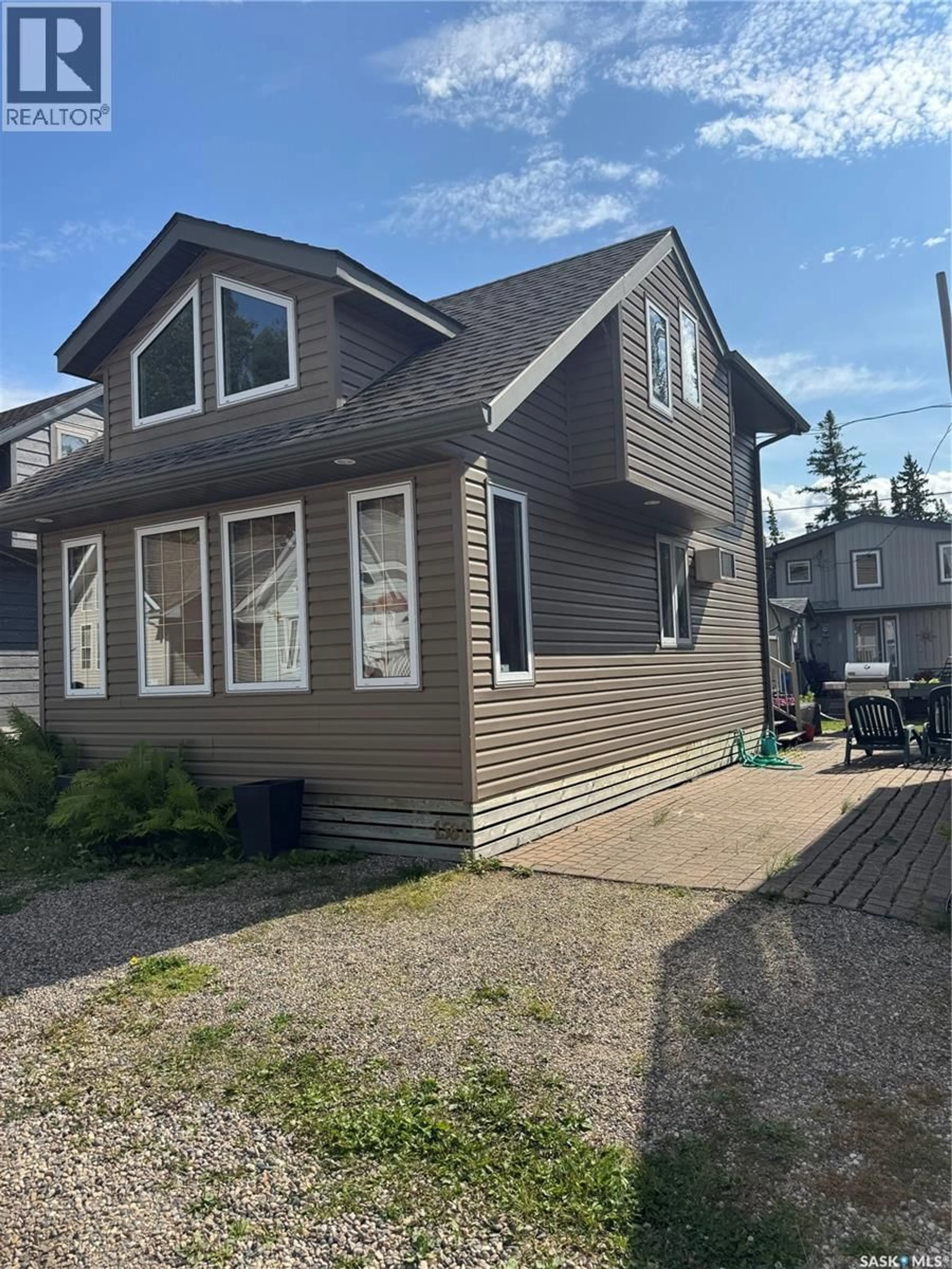 Home with vinyl exterior material, street for 1561 EAGLE, Prince Albert National Park Saskatchewan S0J2Y0