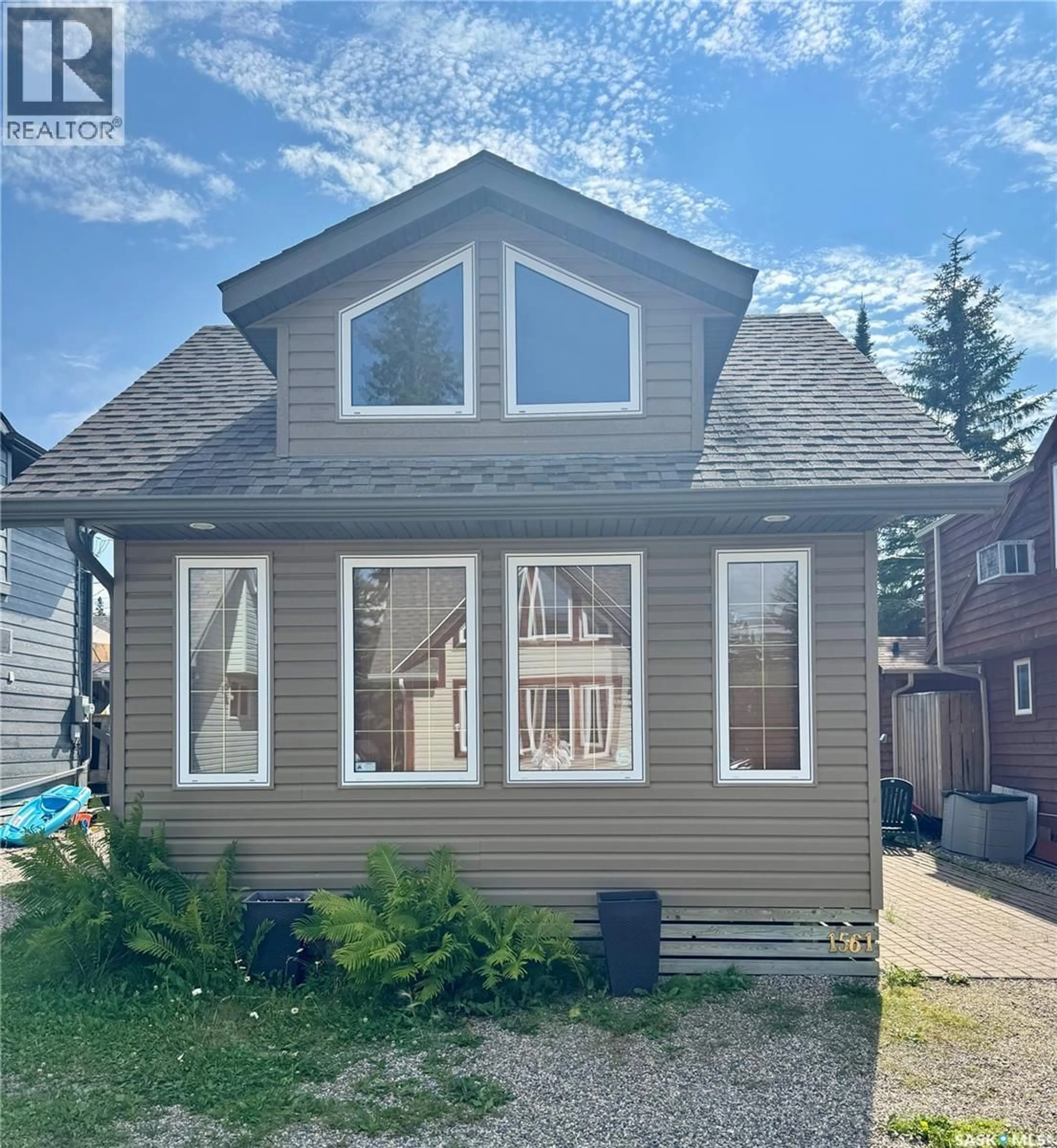 Home with vinyl exterior material, street for 1561 EAGLE, Prince Albert National Park Saskatchewan S0J2Y0