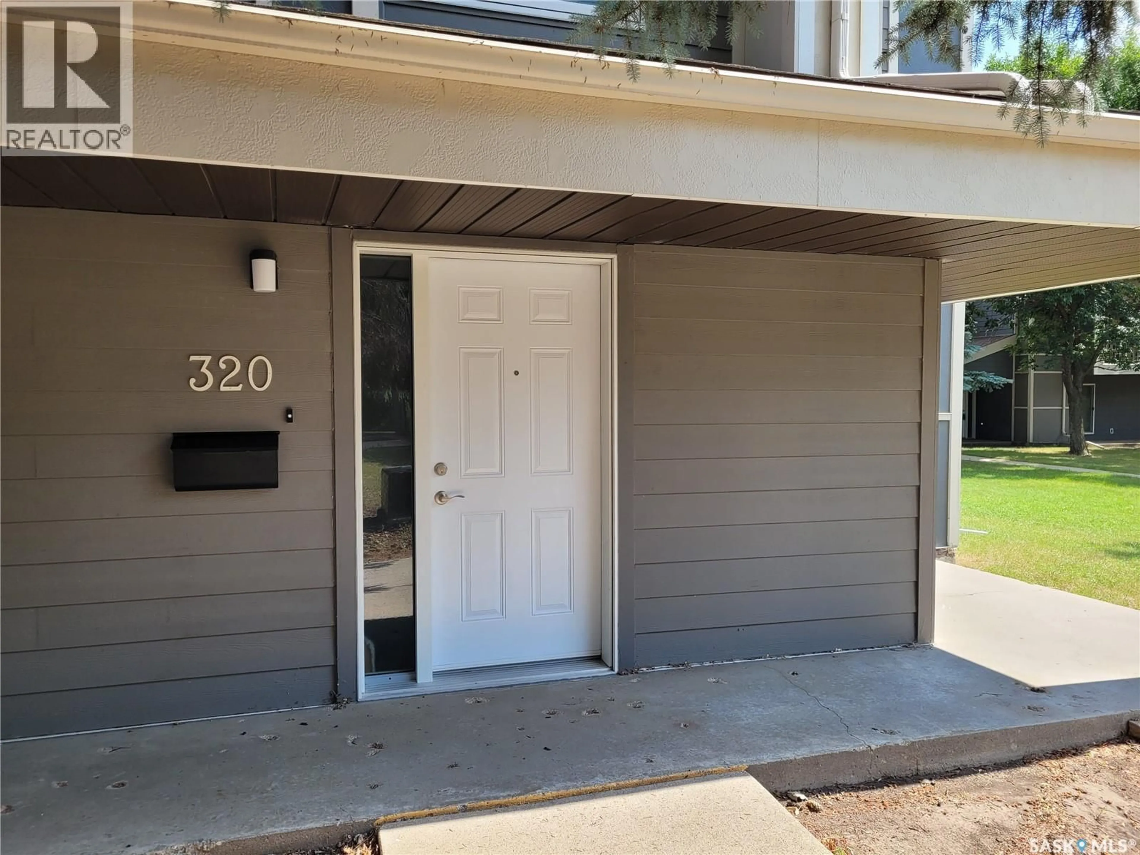 Home with vinyl exterior material, street for 510 - 320 PRAIRIE AVENUE, Saskatoon Saskatchewan S7N2V4