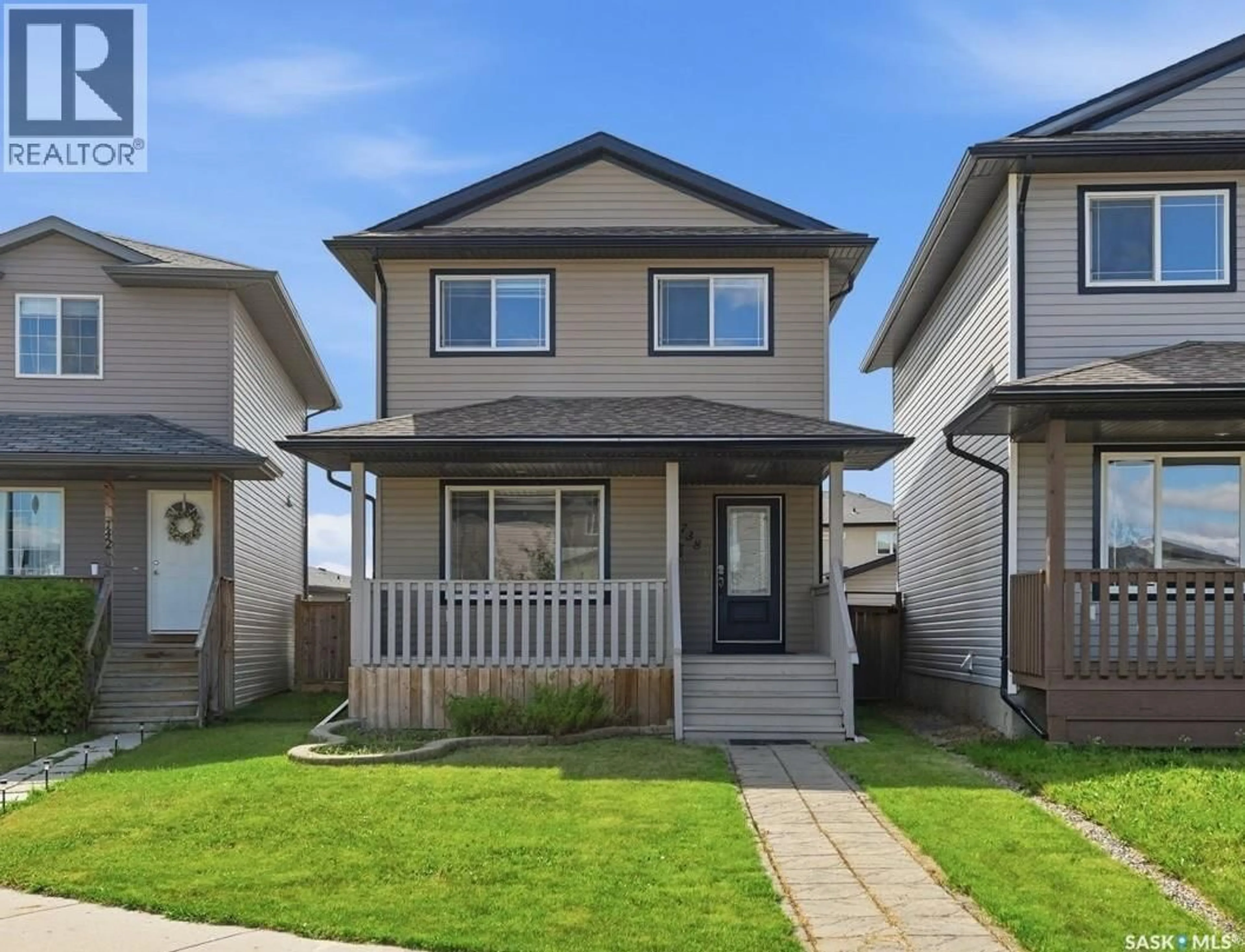 Home with vinyl exterior material, street for 738 LAMARSH LANE, Saskatoon Saskatchewan S7W1B6