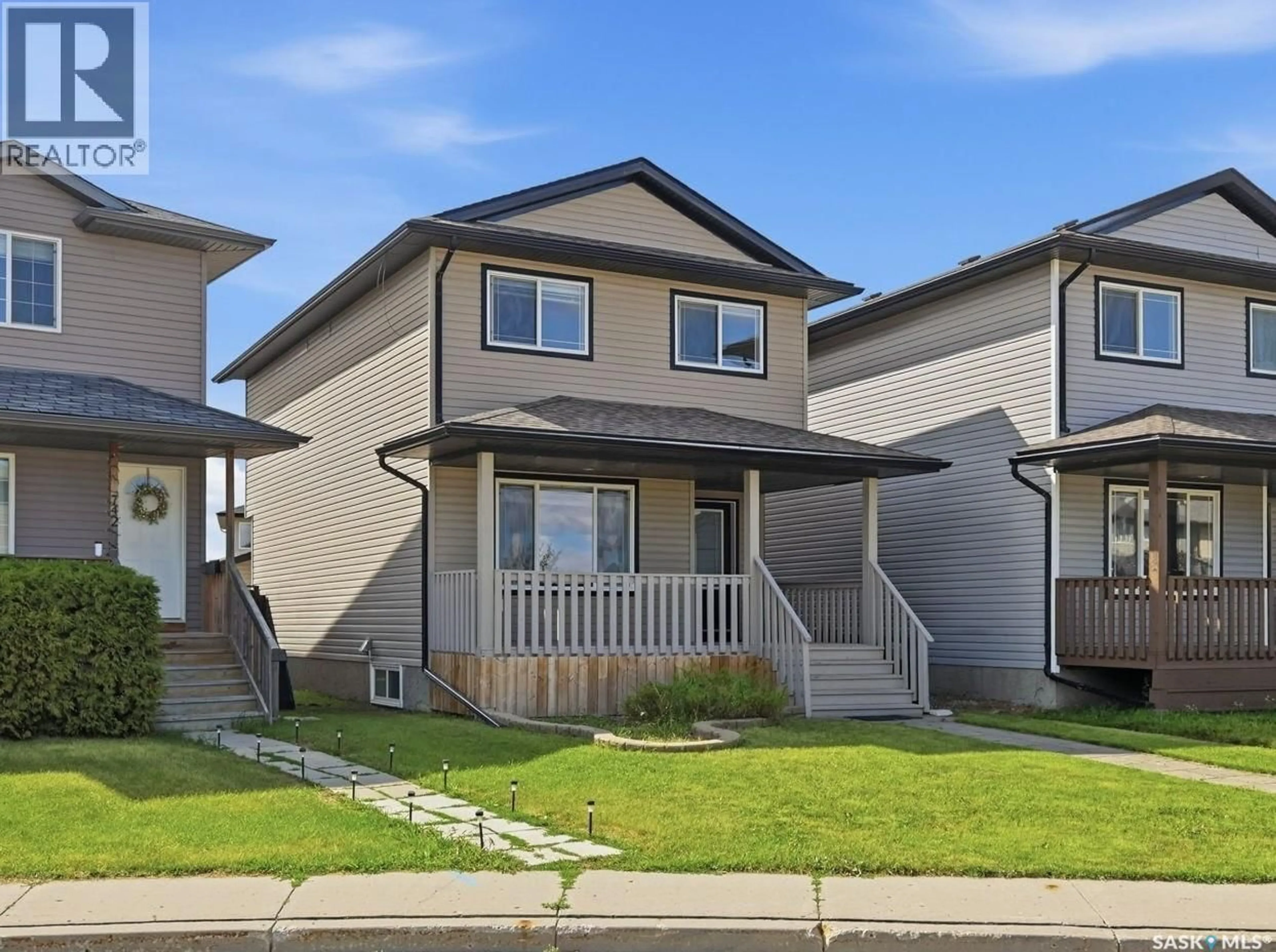 Home with vinyl exterior material, street for 738 LAMARSH LANE, Saskatoon Saskatchewan S7W1B6
