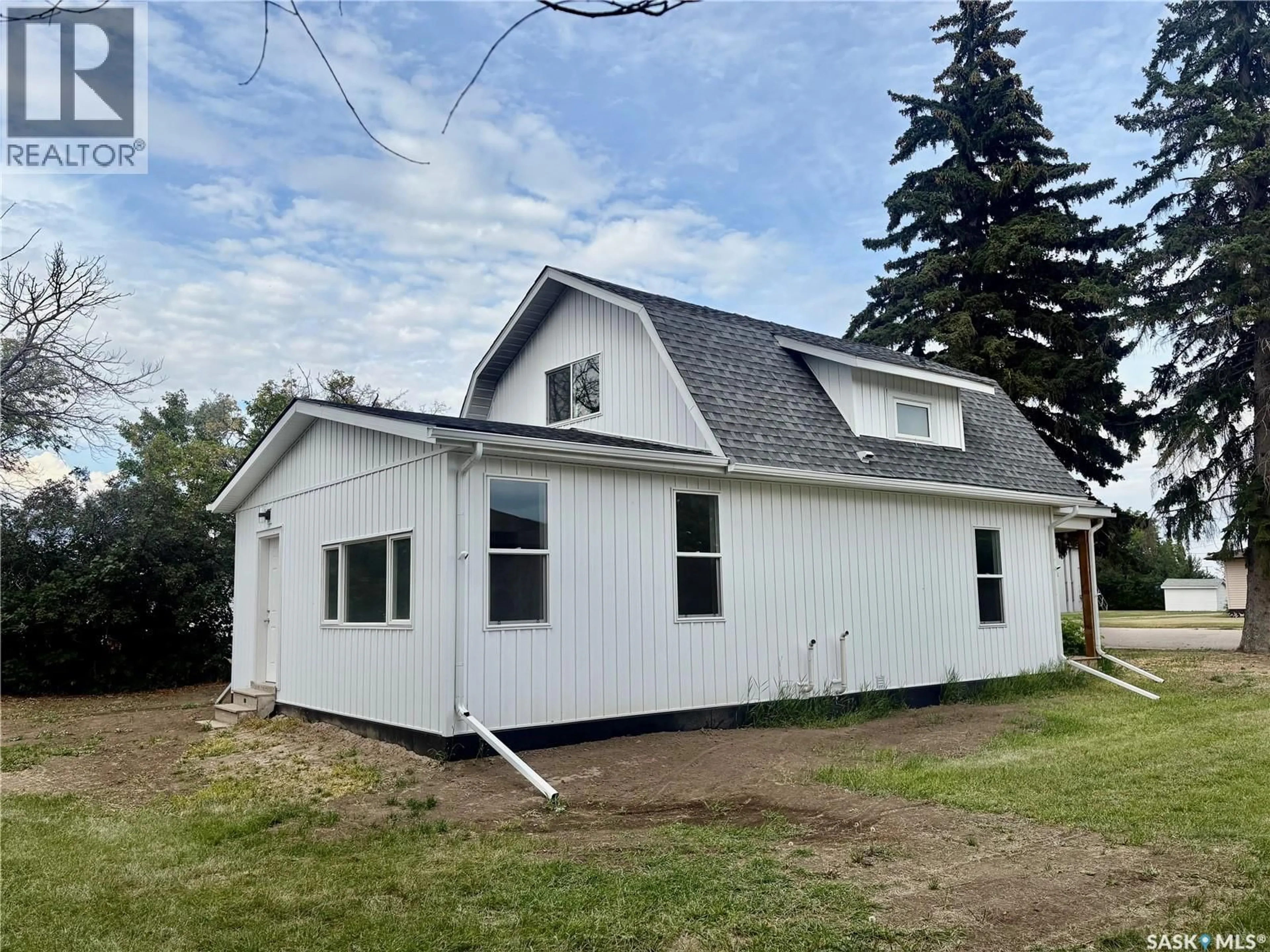 Home with vinyl exterior material, building for 214 THOMSON STREET, Outlook Saskatchewan S0L2N0