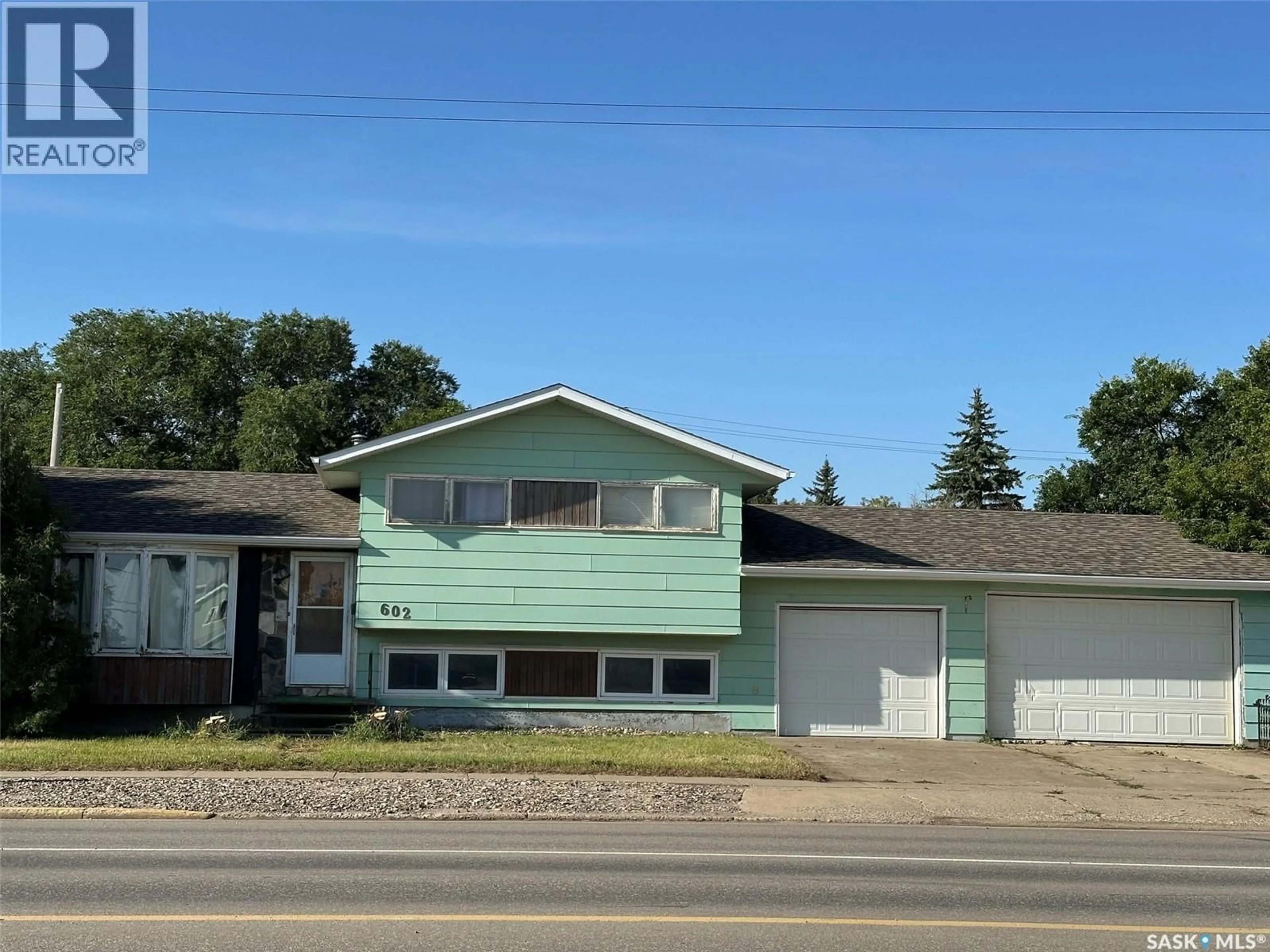 Home with vinyl exterior material, street for 602 4TH STREET, Estevan Saskatchewan S4A0V5