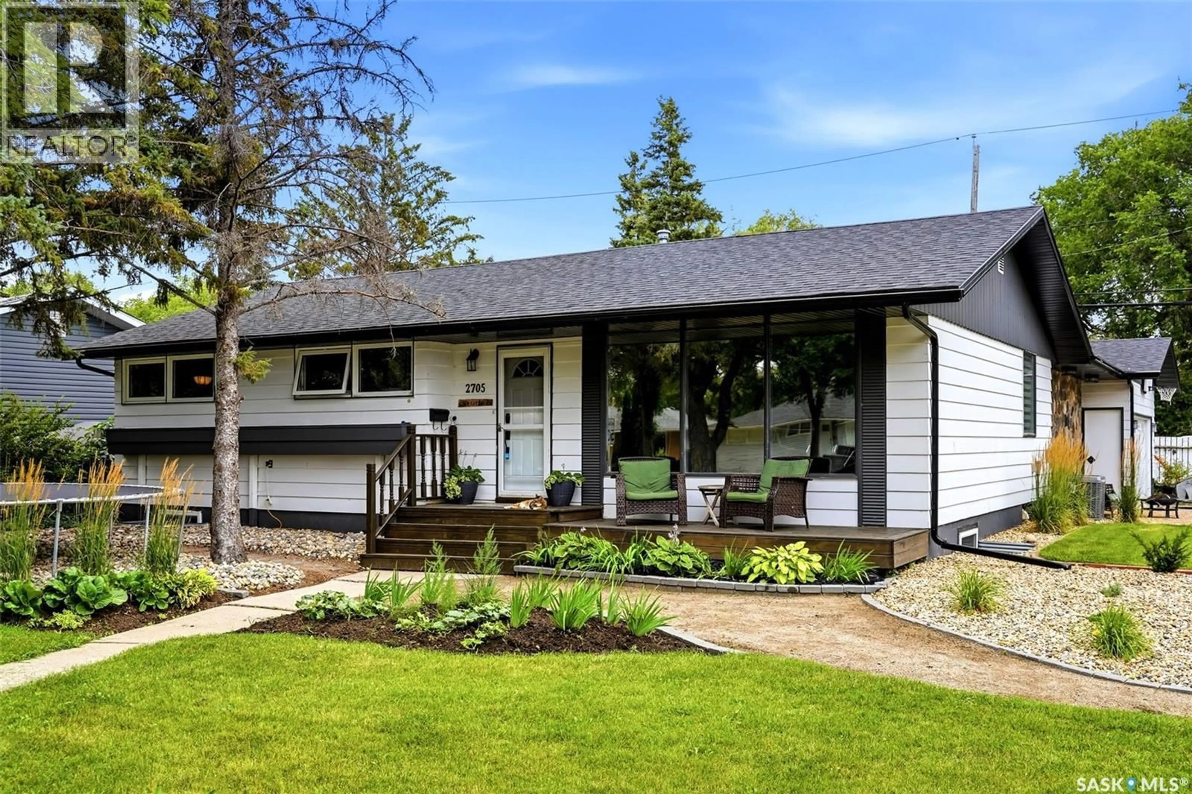 Home with vinyl exterior material, street for 2705 GRANT ROAD, Regina Saskatchewan S4S5G1