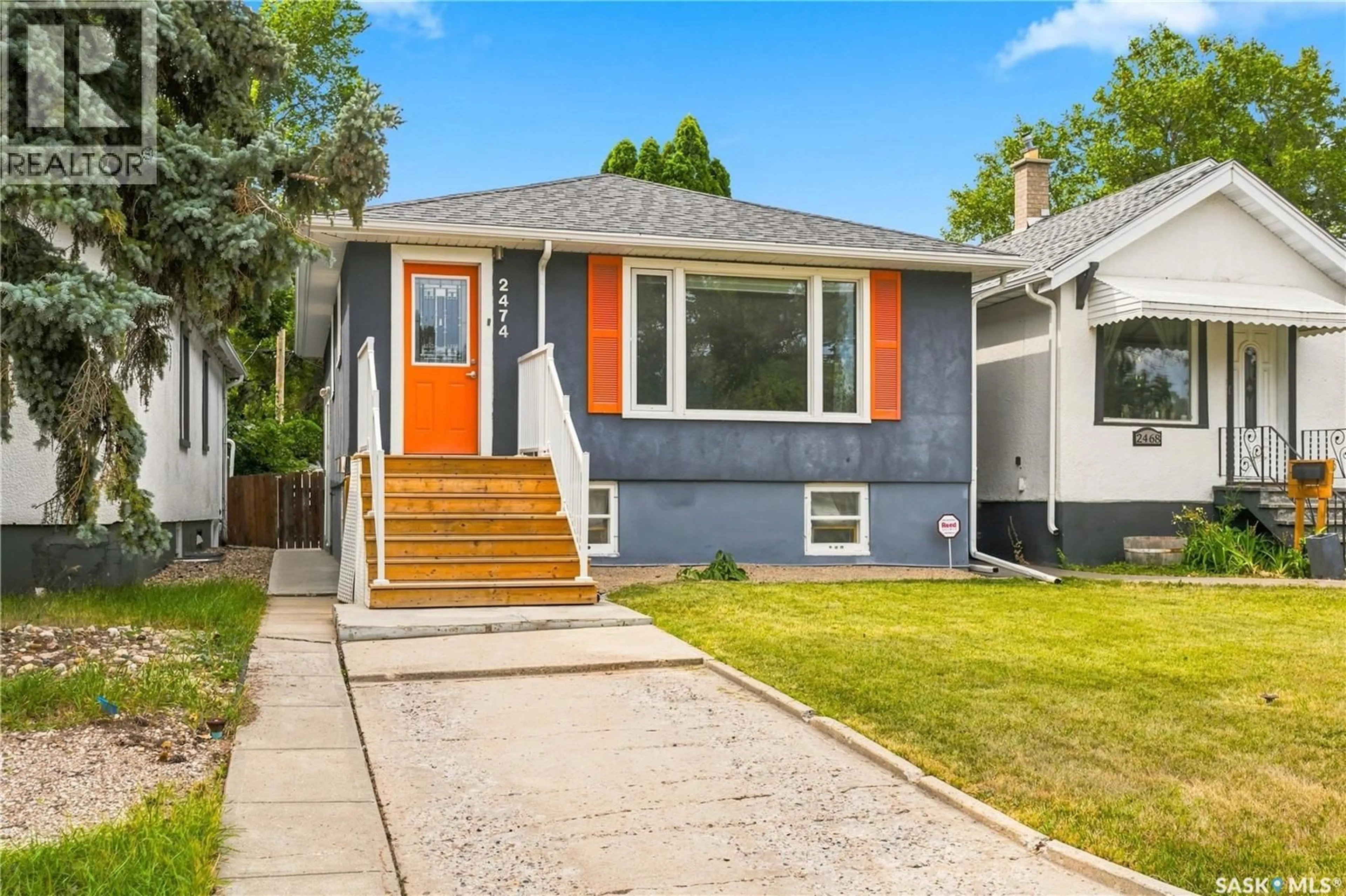 Home with vinyl exterior material, street for 2474 ELLIOTT STREET, Regina Saskatchewan S4N3M3
