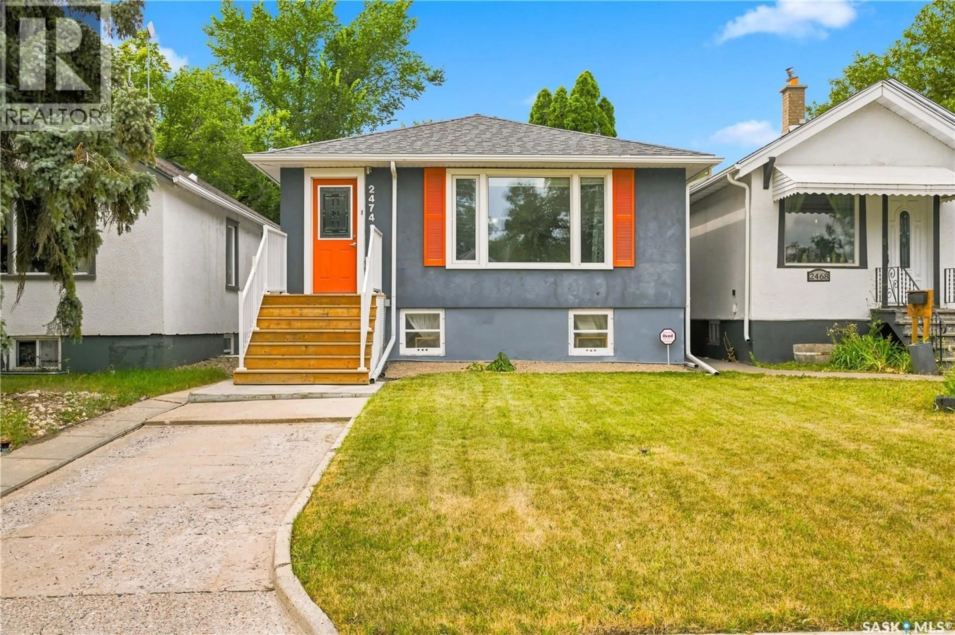 Home with vinyl exterior material, street for 2474 ELLIOTT STREET, Regina Saskatchewan S4N3M3