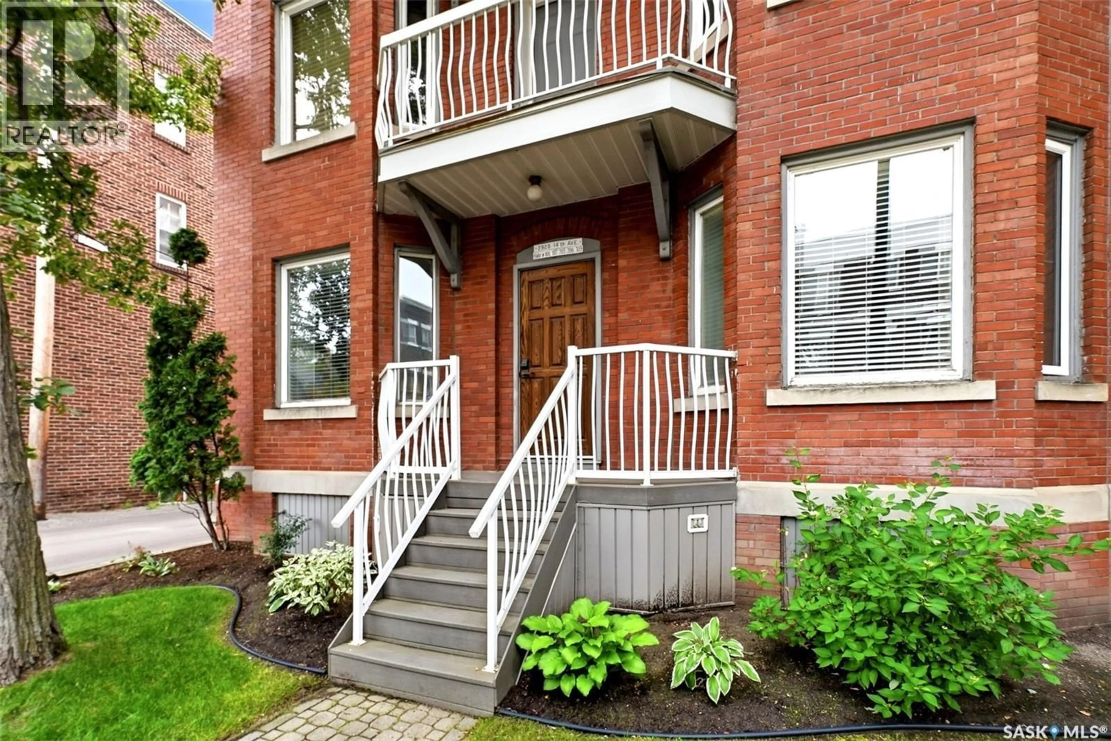 Home with brick exterior material, street for 305 - 2925 14TH AVENUE, Regina Saskatchewan S4T1R5