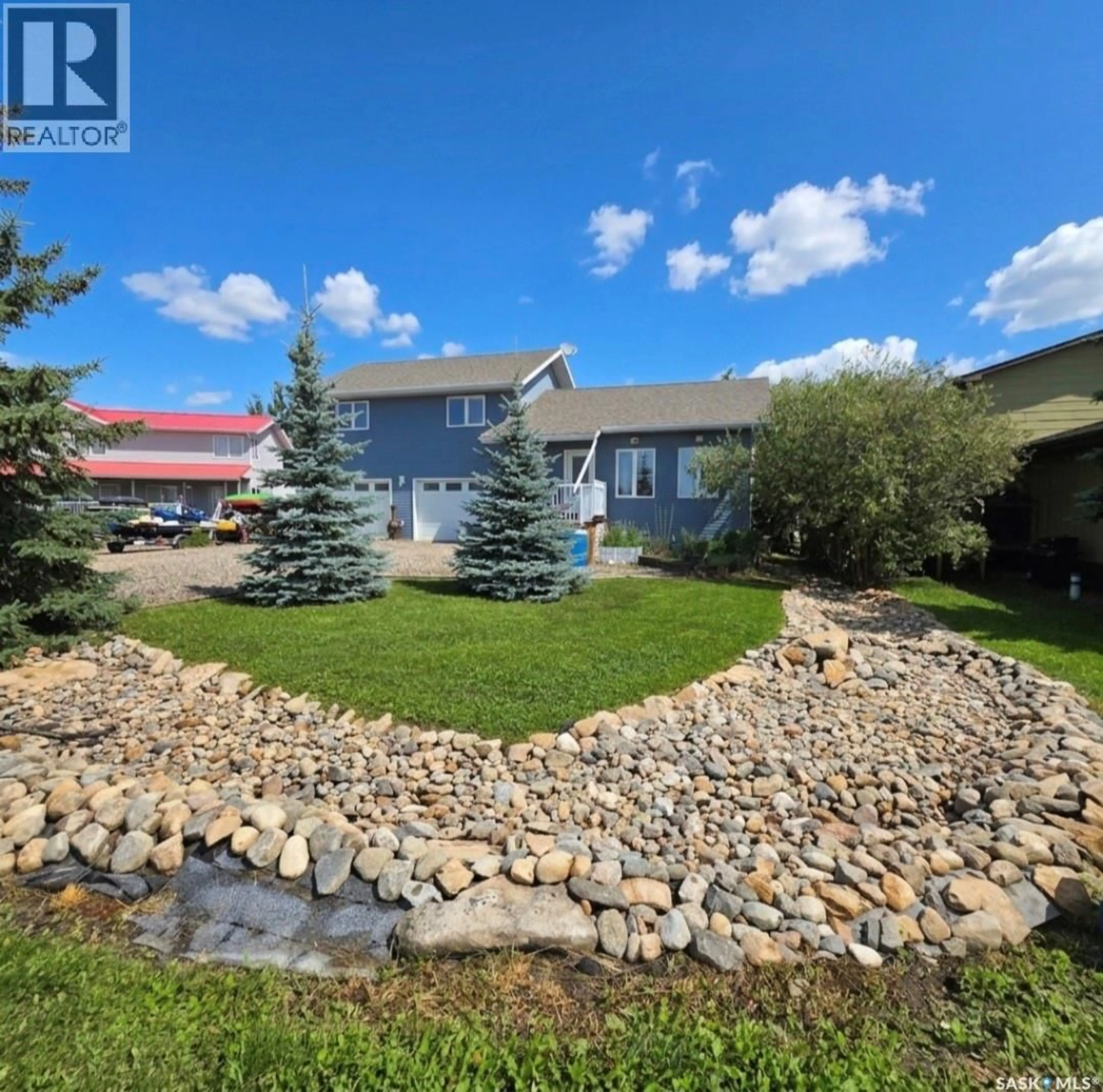 A pic from outside/outdoor area/front of a property/back of a property/a pic from drone, water/lake/river/ocean view for 14 PINE CRESCENT, Candle Lake Saskatchewan S0J3E0