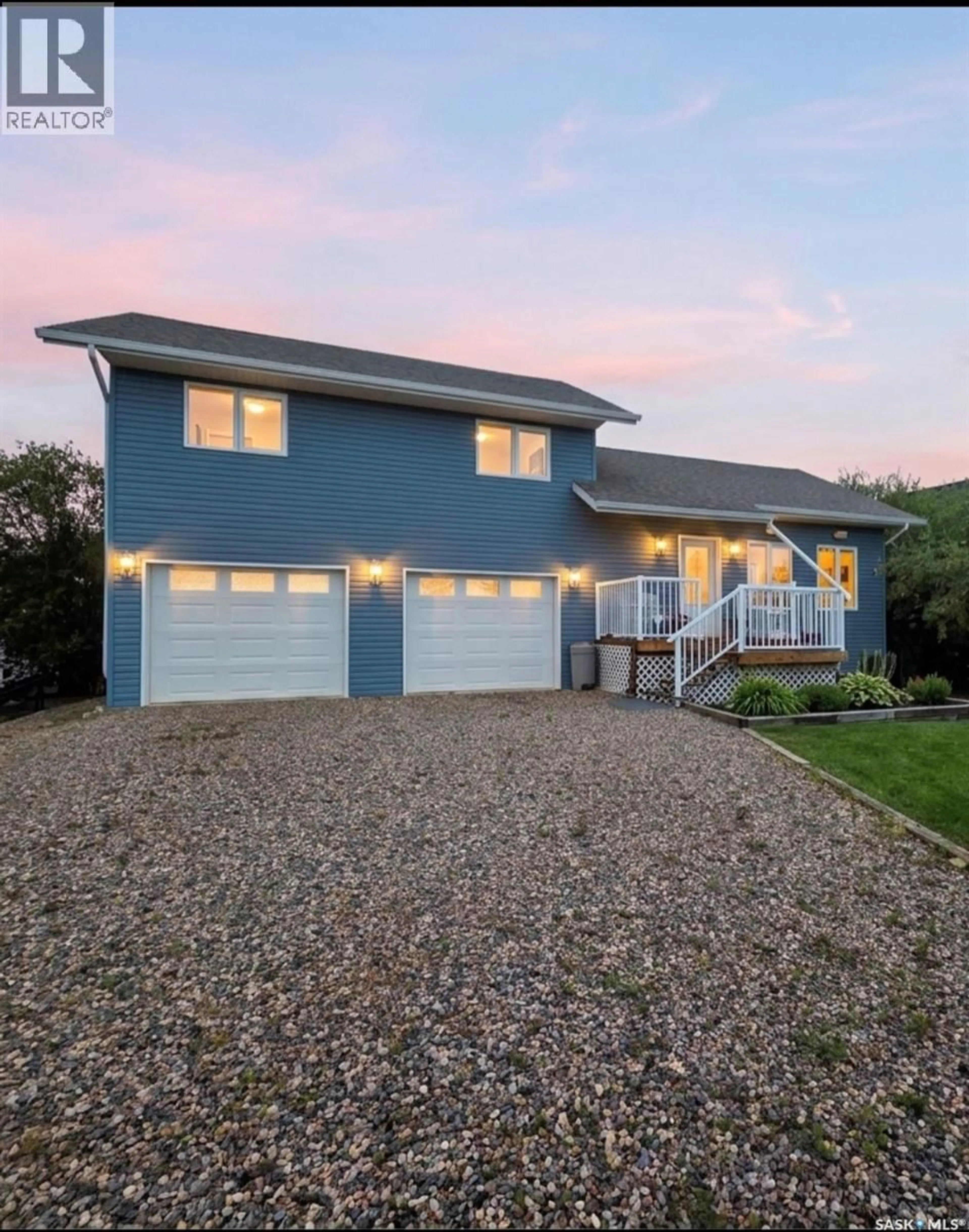 Home with vinyl exterior material, street for 14 PINE CRESCENT, Candle Lake Saskatchewan S0J3E0