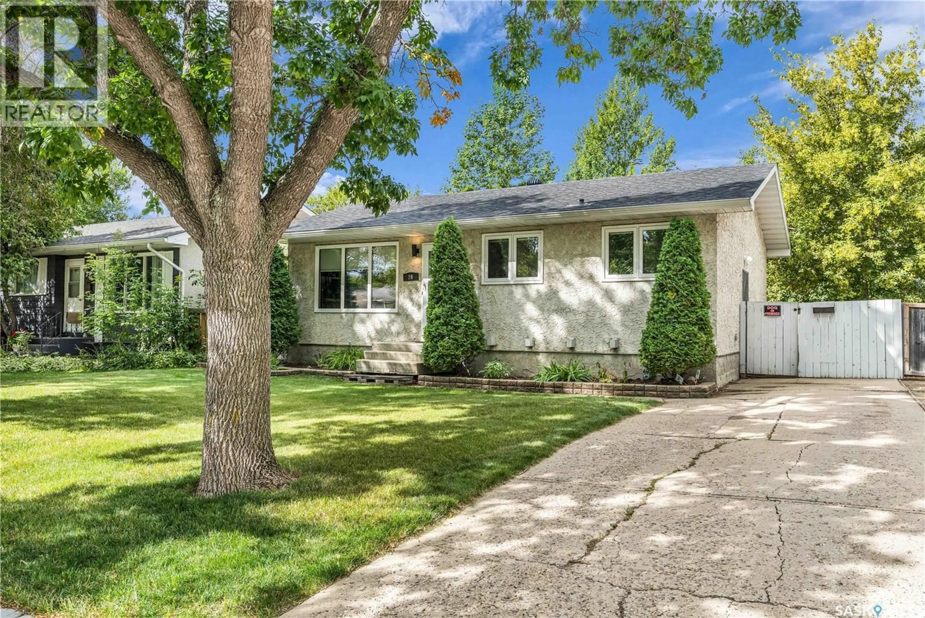 Home with vinyl exterior material, street for 26 FYFE STREET, Regina Saskatchewan S4X1J8