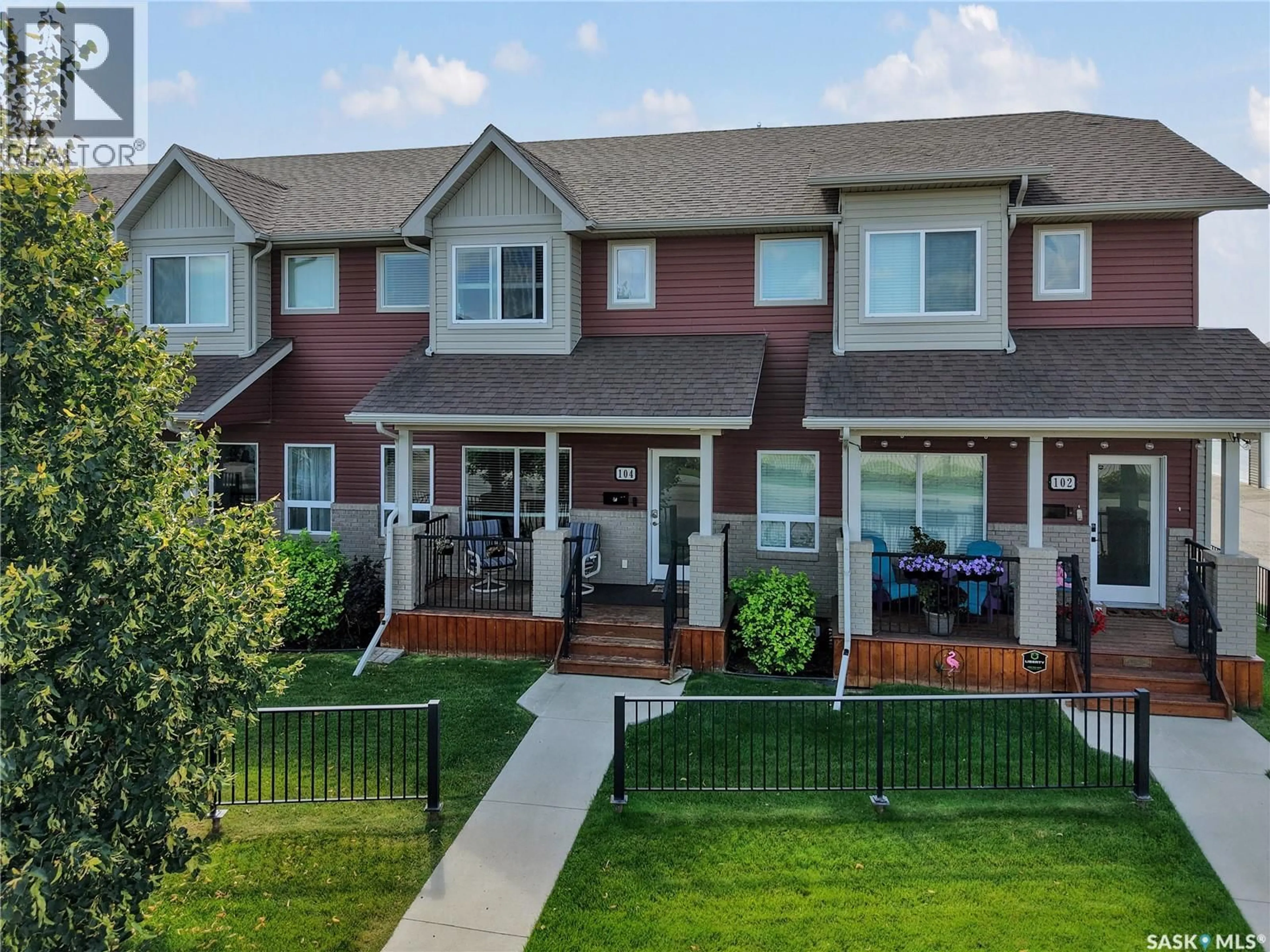 A pic from outside/outdoor area/front of a property/back of a property/a pic from drone, street for 104 SHEPHERD CRESCENT, Saskatoon Saskatchewan S7W0L7