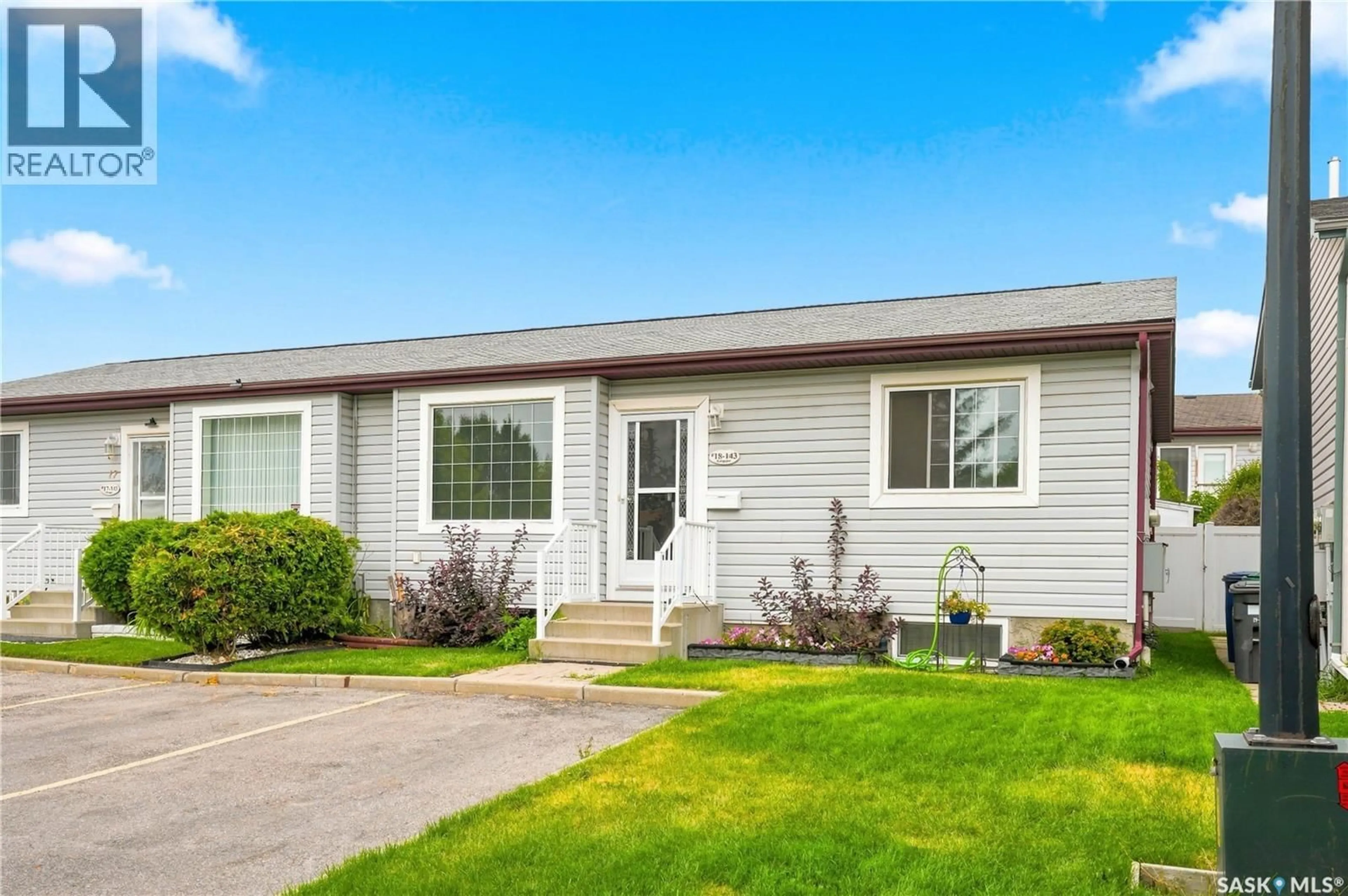 Home with vinyl exterior material, street for 18 143 GROPPER CRESCENT, Saskatoon Saskatchewan S7M5W2