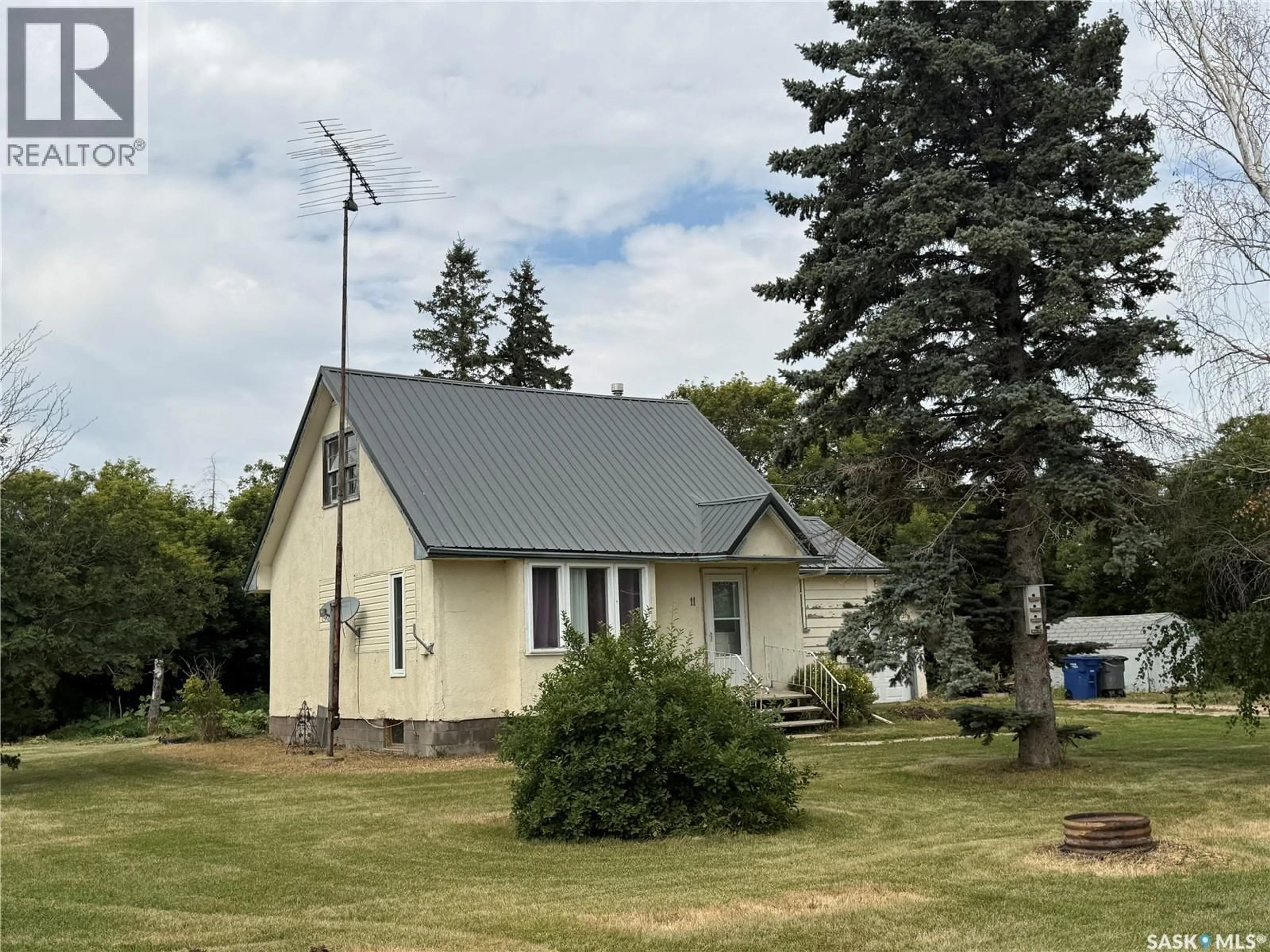 A pic from outside/outdoor area/front of a property/back of a property/a pic from drone, street for 11 BISON STREET, Osage Saskatchewan S0G3T0