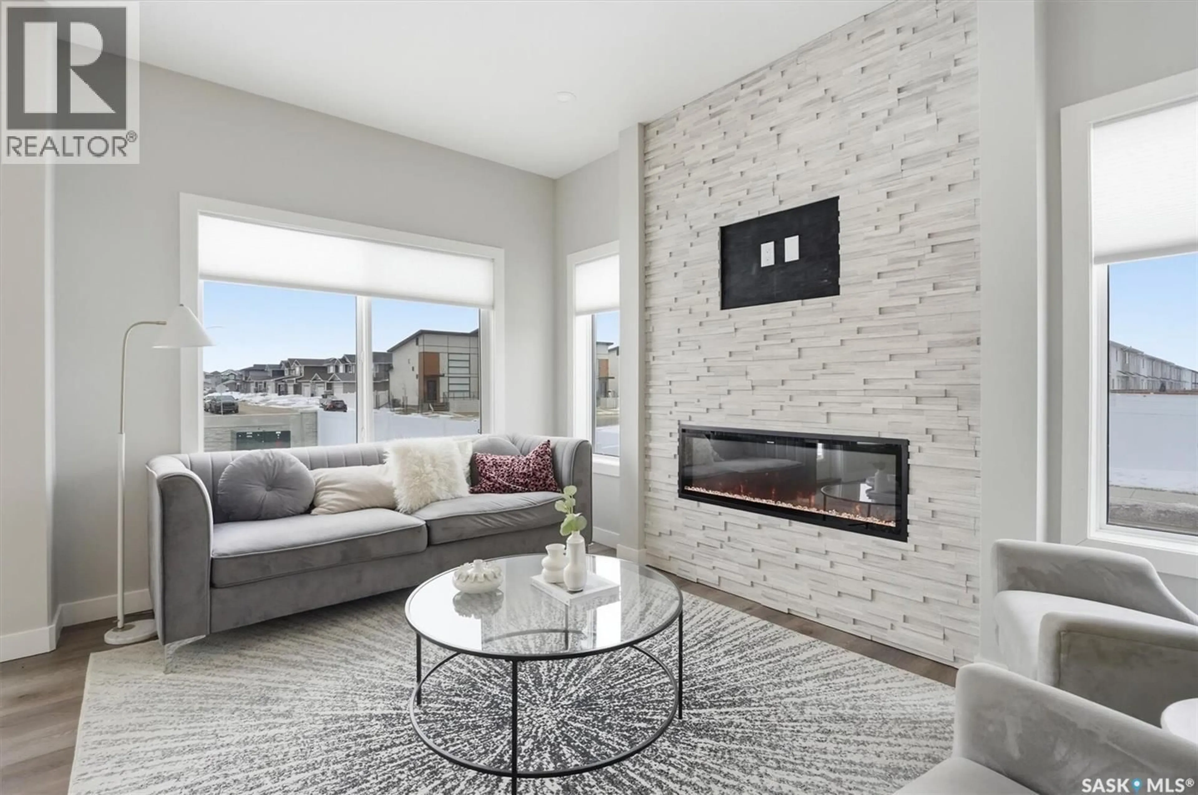 Living room with furniture, ceramic/tile floor for 1266 YUEL WAY, Saskatoon Saskatchewan S7V0S1