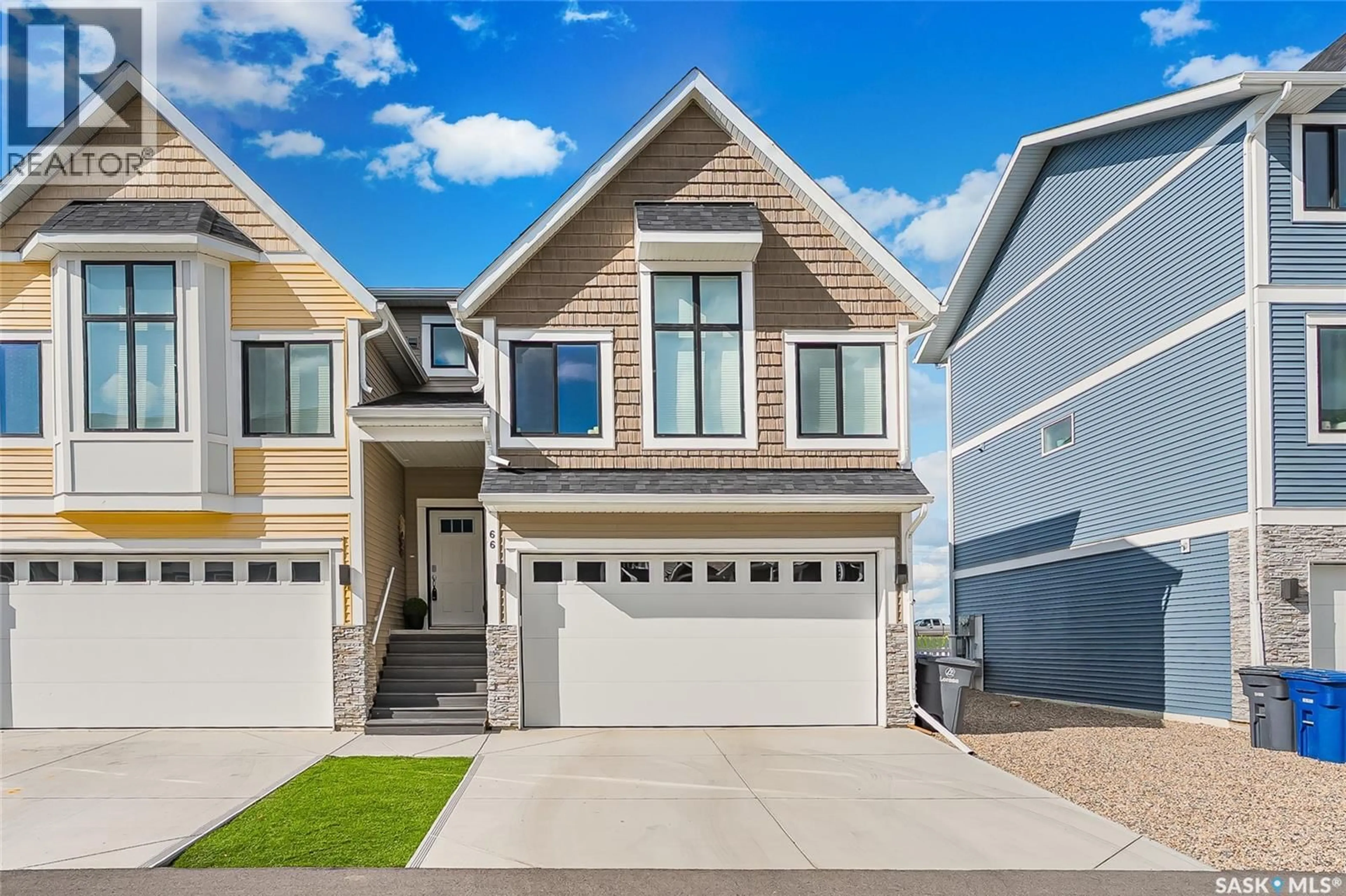 Home with vinyl exterior material, street for 66 ST ANDREWS LANE, Warman Saskatchewan S0K4S4