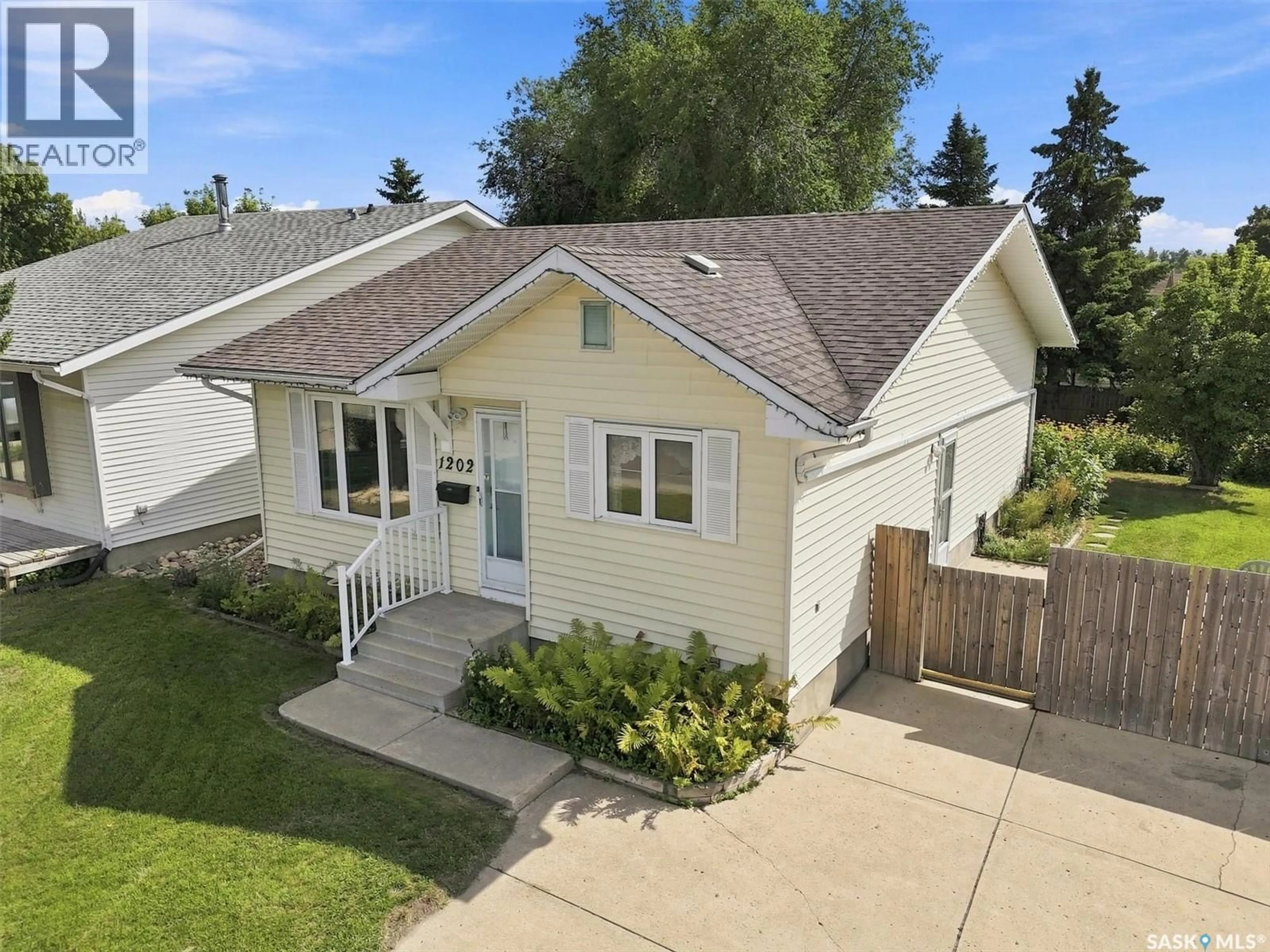 A pic from outside/outdoor area/front of a property/back of a property/a pic from drone, street for 1202 MCCORMACK ROAD, Saskatoon Saskatchewan S7M5L9