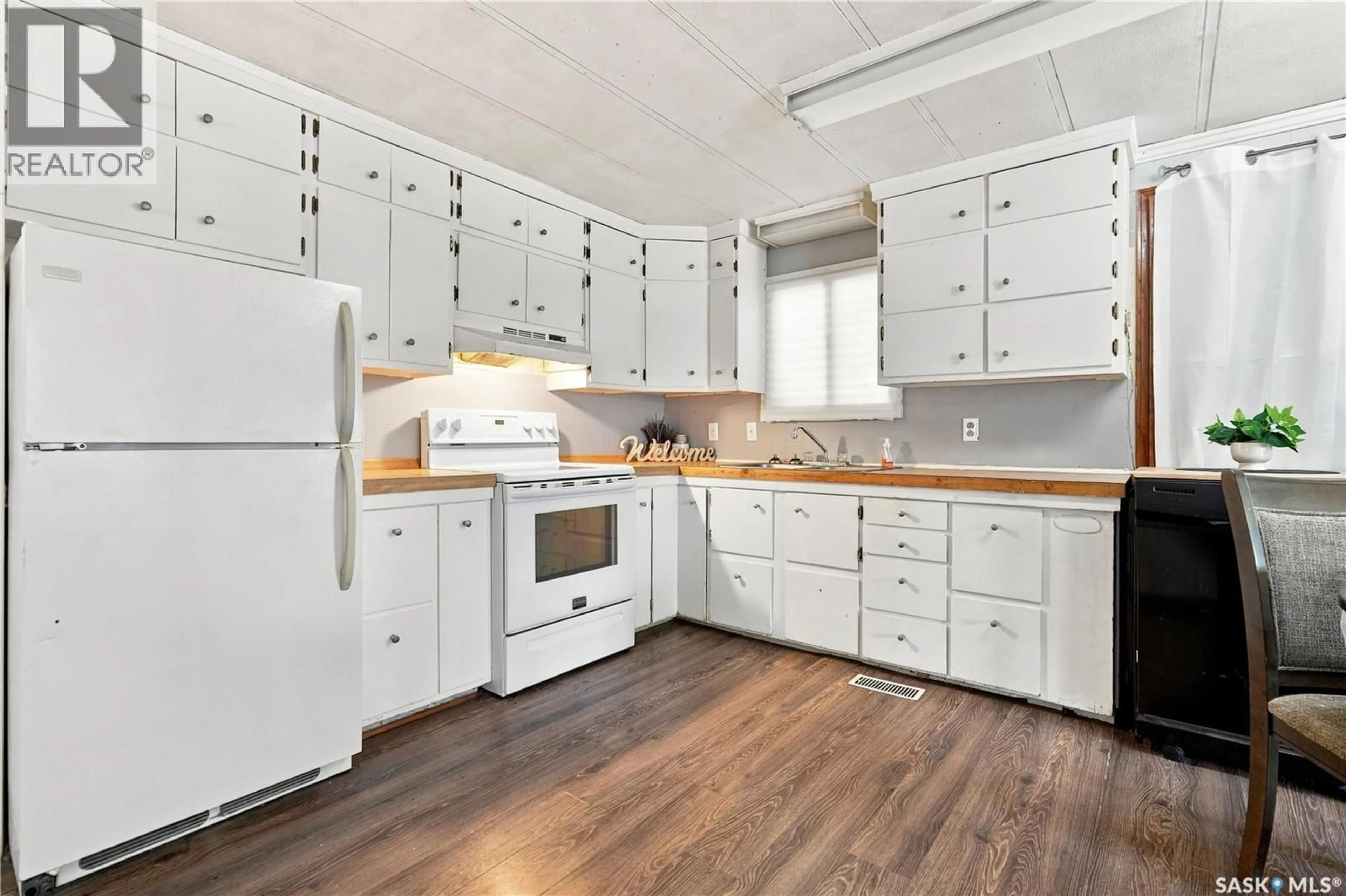 Standard kitchen, wood/laminate floor for 310 SECOND STREET, Mclean Saskatchewan S0G3E0