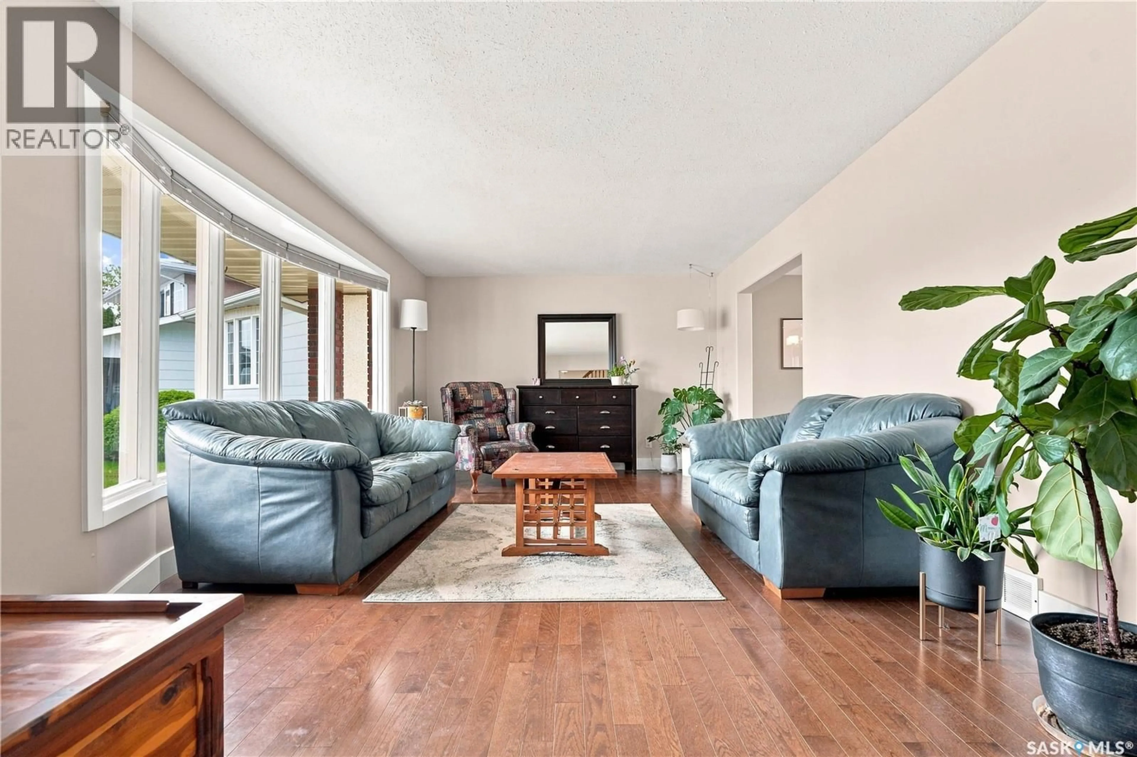 Living room with furniture, unknown for 242 AULD CRESCENT, Saskatoon Saskatchewan S7H4W9