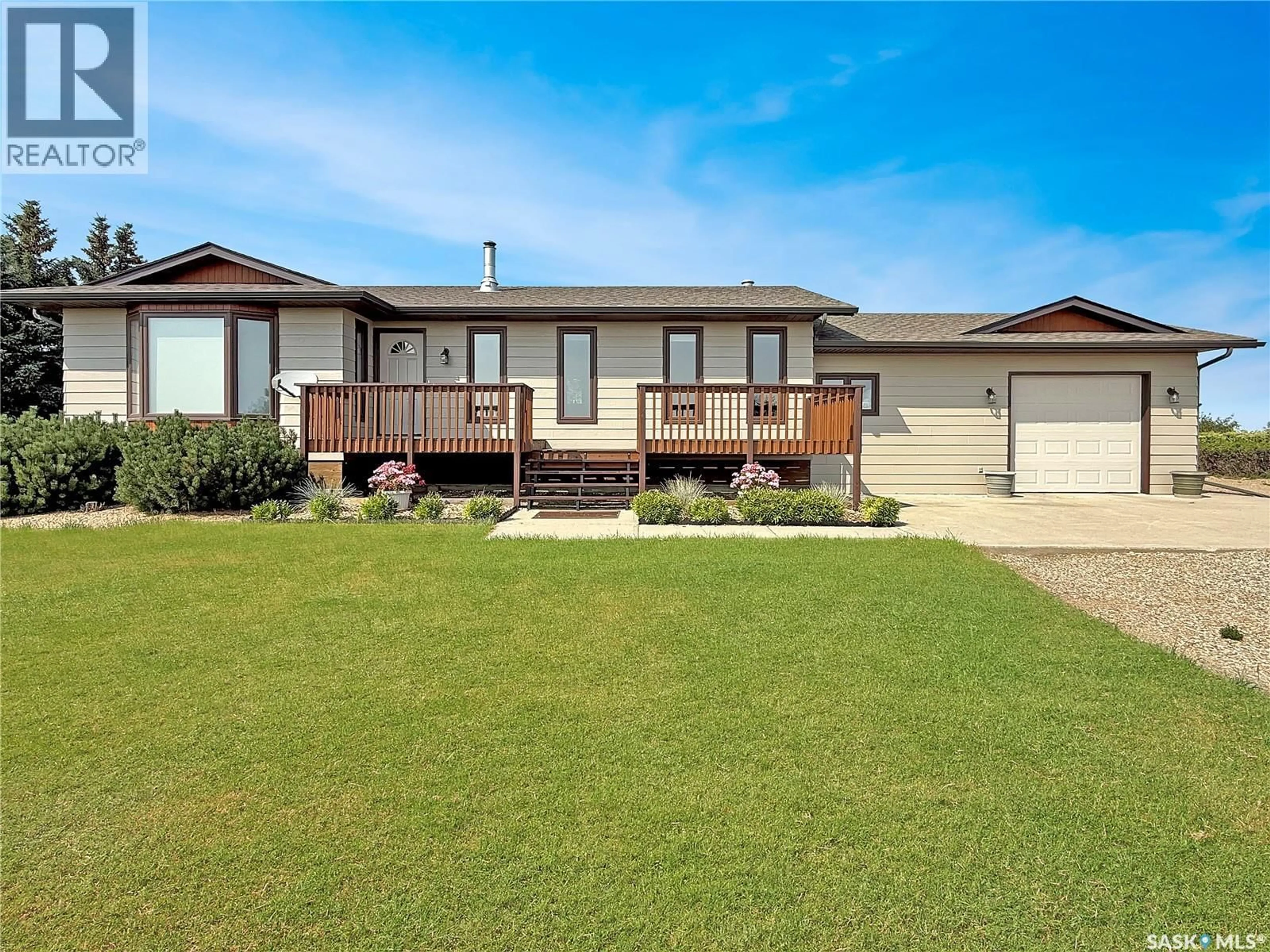 Home with vinyl exterior material, street for LAC PELLETIER ACREAGE, Lac Pelletier Rm No. 107 Saskatchewan S9H4G5