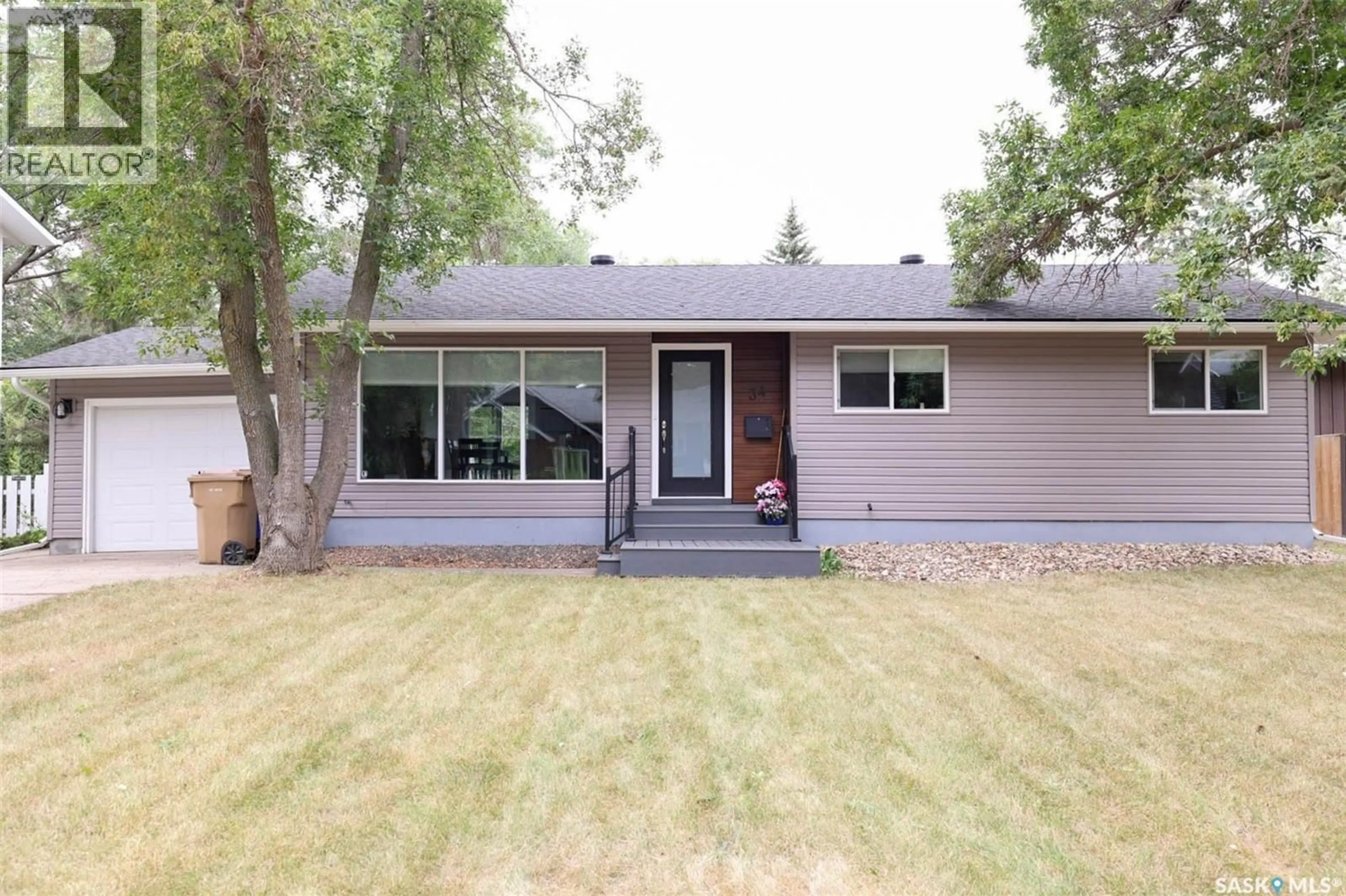 Home with vinyl exterior material, street for 34 ELMWOOD PLACE, Regina Saskatchewan S4S5M3