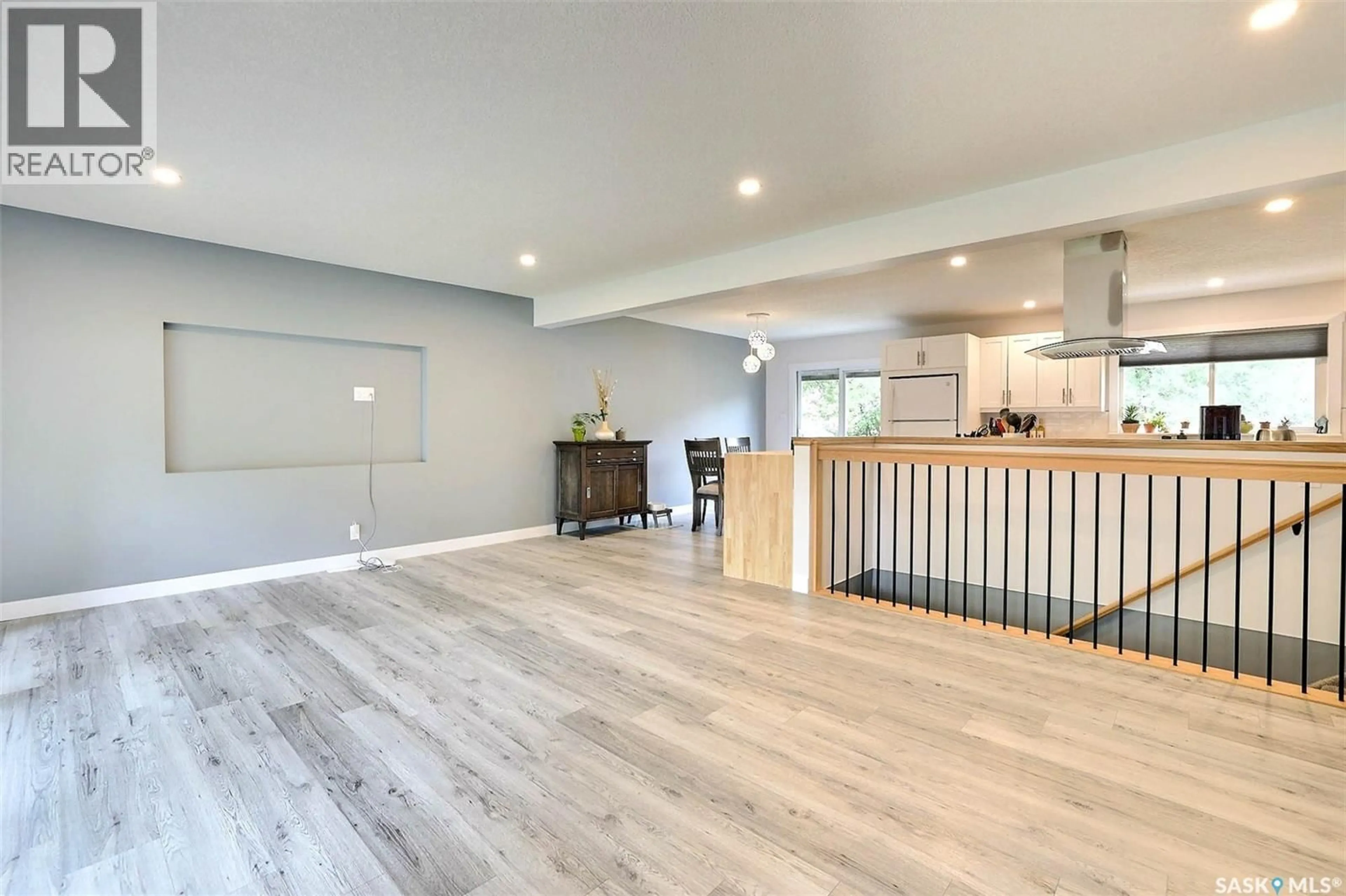 Open concept kitchen, wood/laminate floor for 34 ELMWOOD PLACE, Regina Saskatchewan S4S5M3