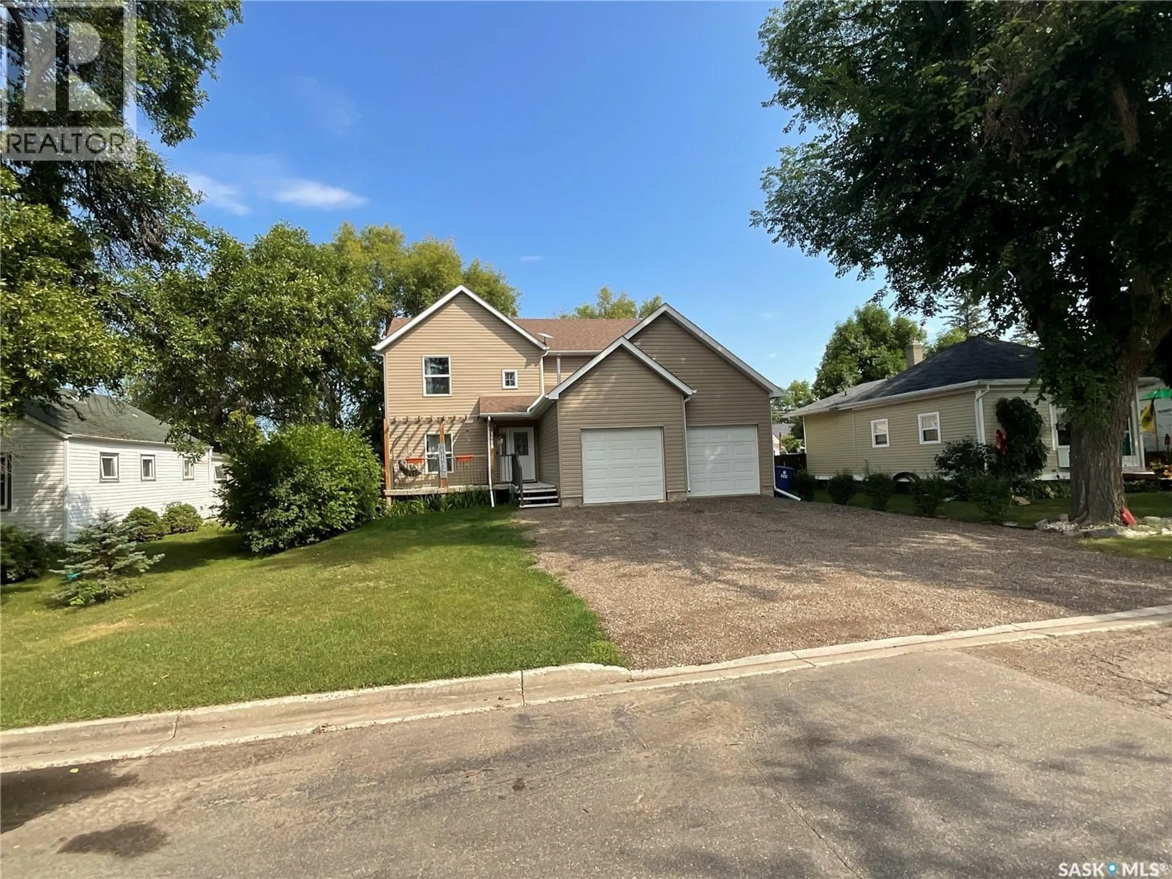 A pic from outside/outdoor area/front of a property/back of a property/a pic from drone, street for 2018 8TH STREET, Rosthern Saskatchewan S0K3R0