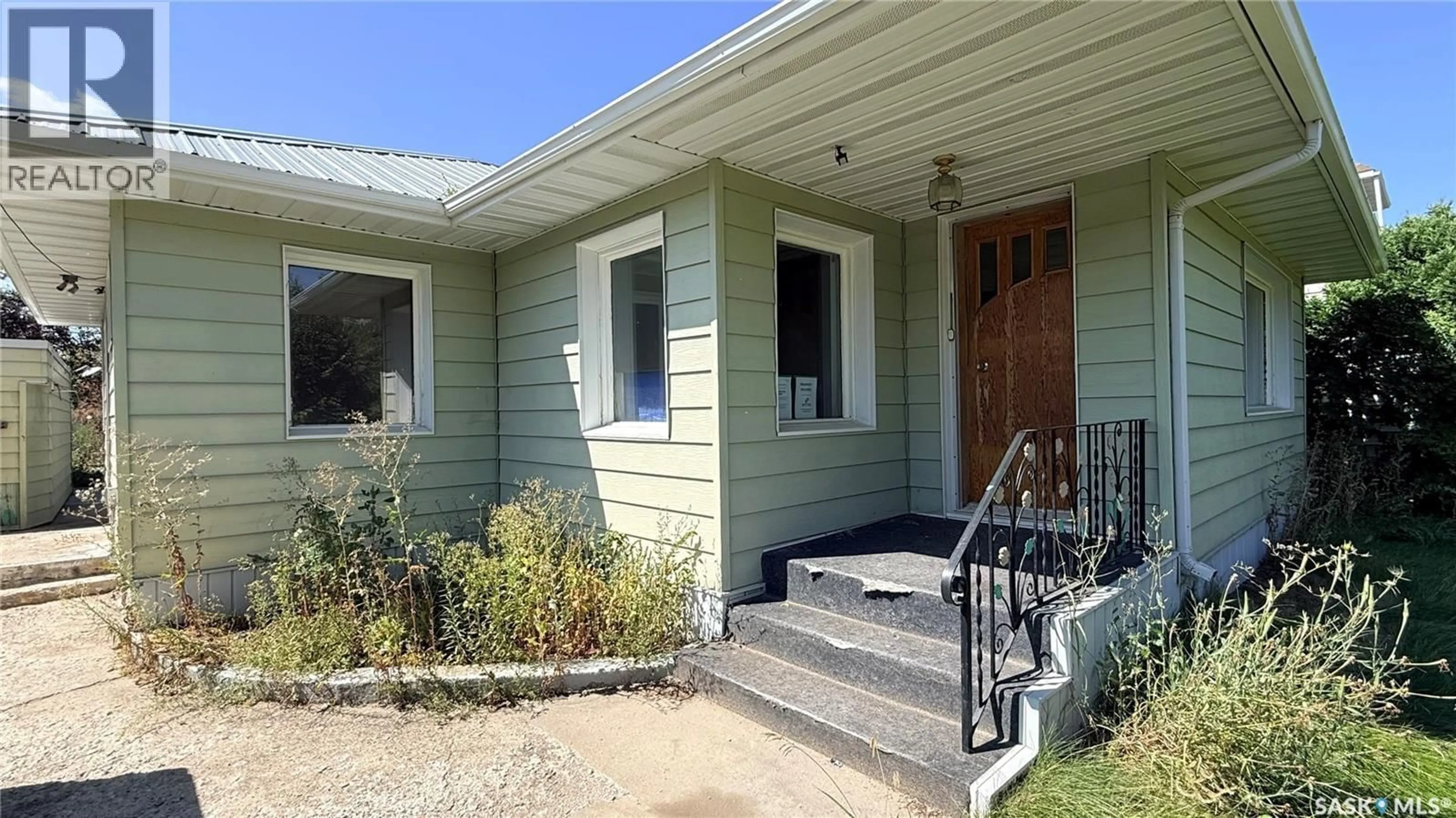 Home with vinyl exterior material, street for 1710 THIRD STREET, Estevan Saskatchewan S4A0S8