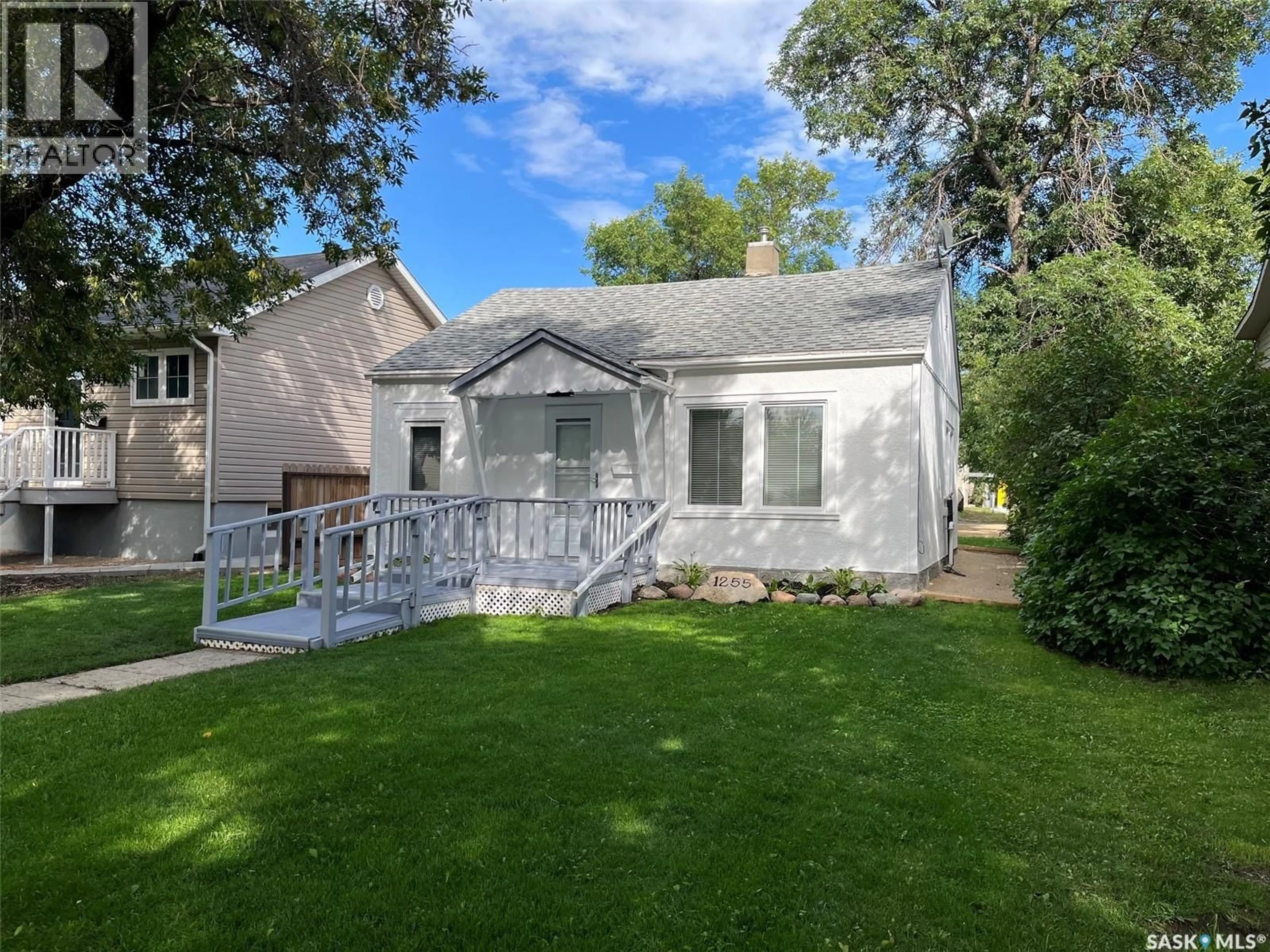 Home with vinyl exterior material, street for 1255 ATKINSON STREET, Regina Saskatchewan S4N3V7