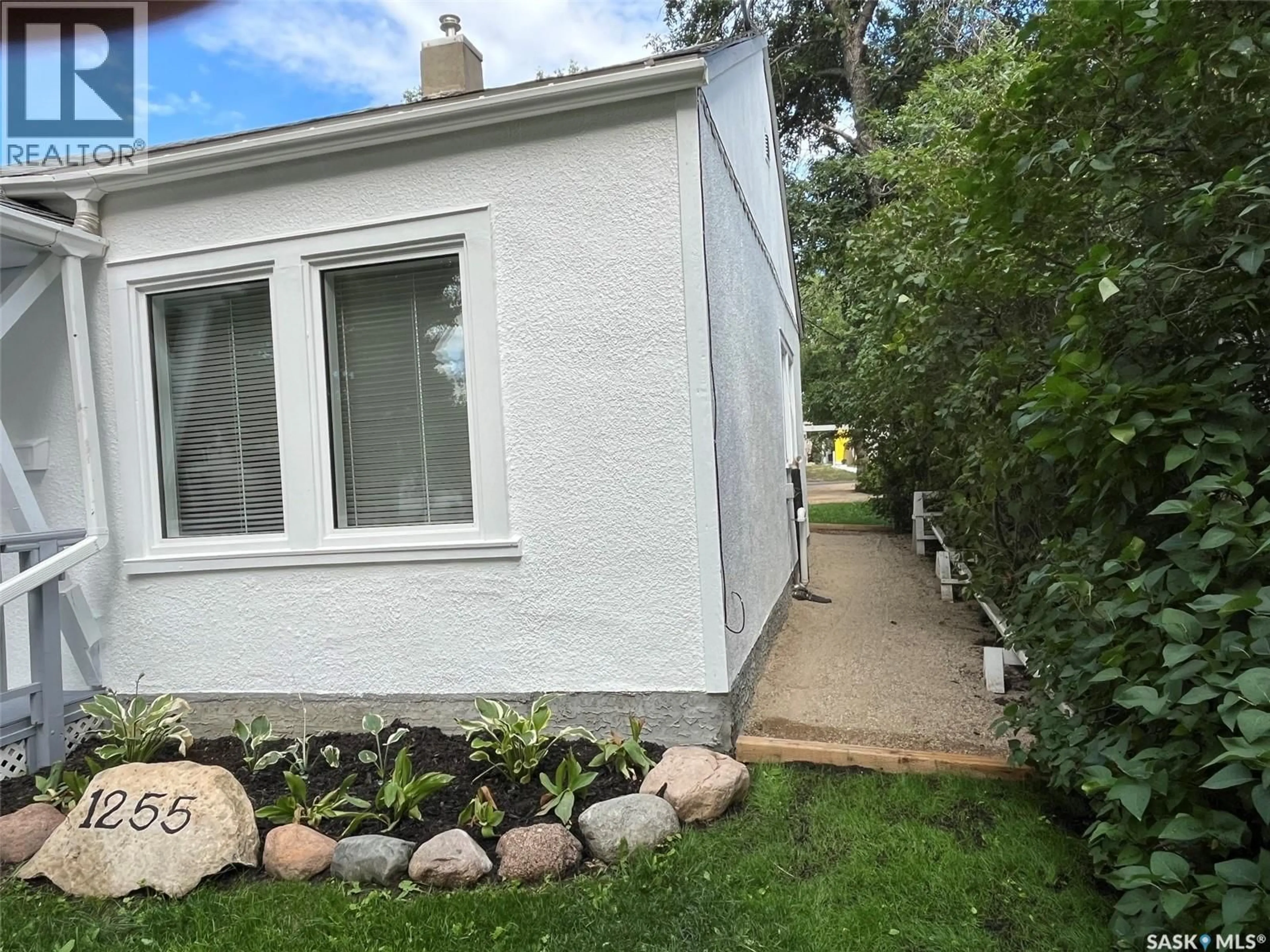 A pic from outside/outdoor area/front of a property/back of a property/a pic from drone, street for 1255 ATKINSON STREET, Regina Saskatchewan S4N3V7