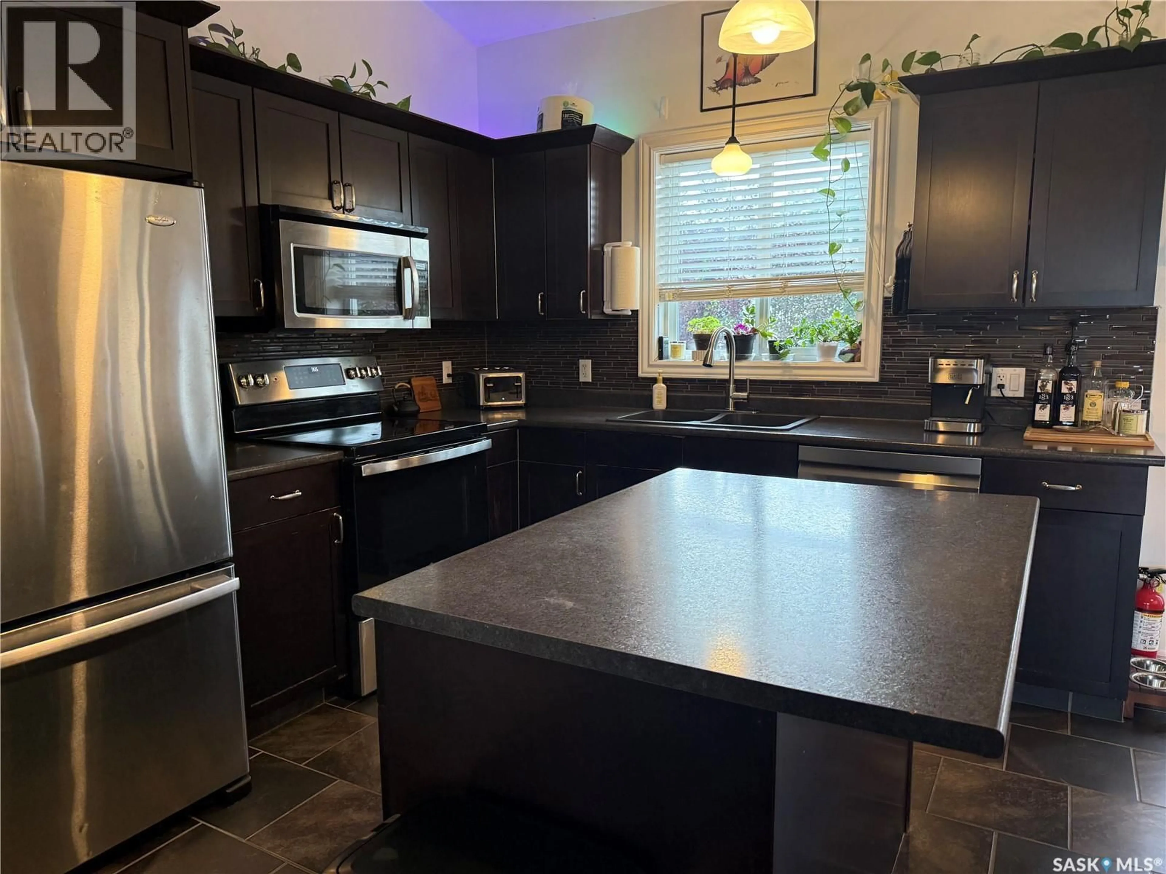 Open concept kitchen, unknown for 903 SINOTTE STREET, La Ronge Saskatchewan S0J1L0