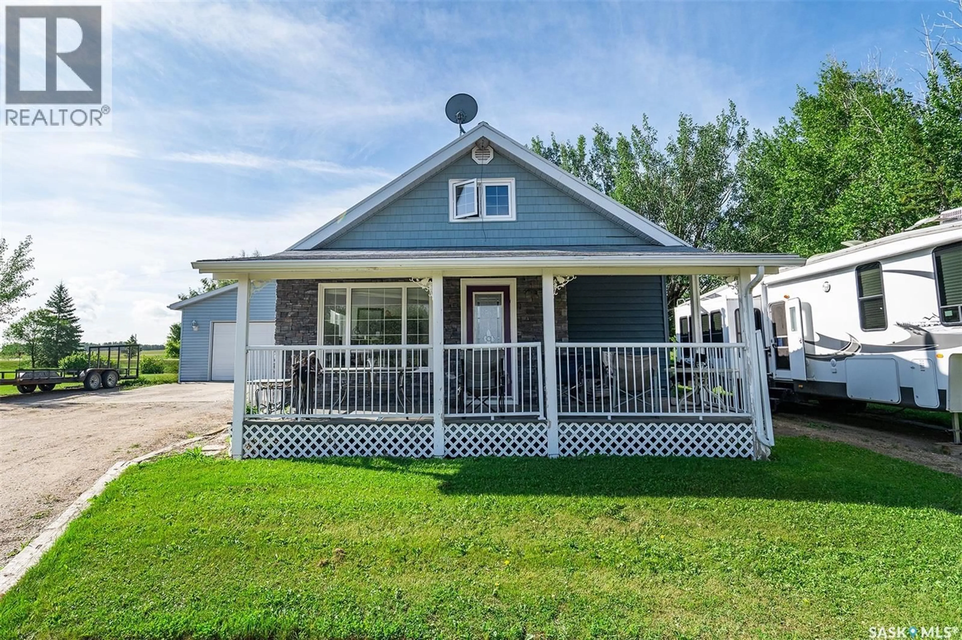 Home with vinyl exterior material, street for REID ACREAGE, Big Quill Rm No. 308 Saskatchewan S0A4T0