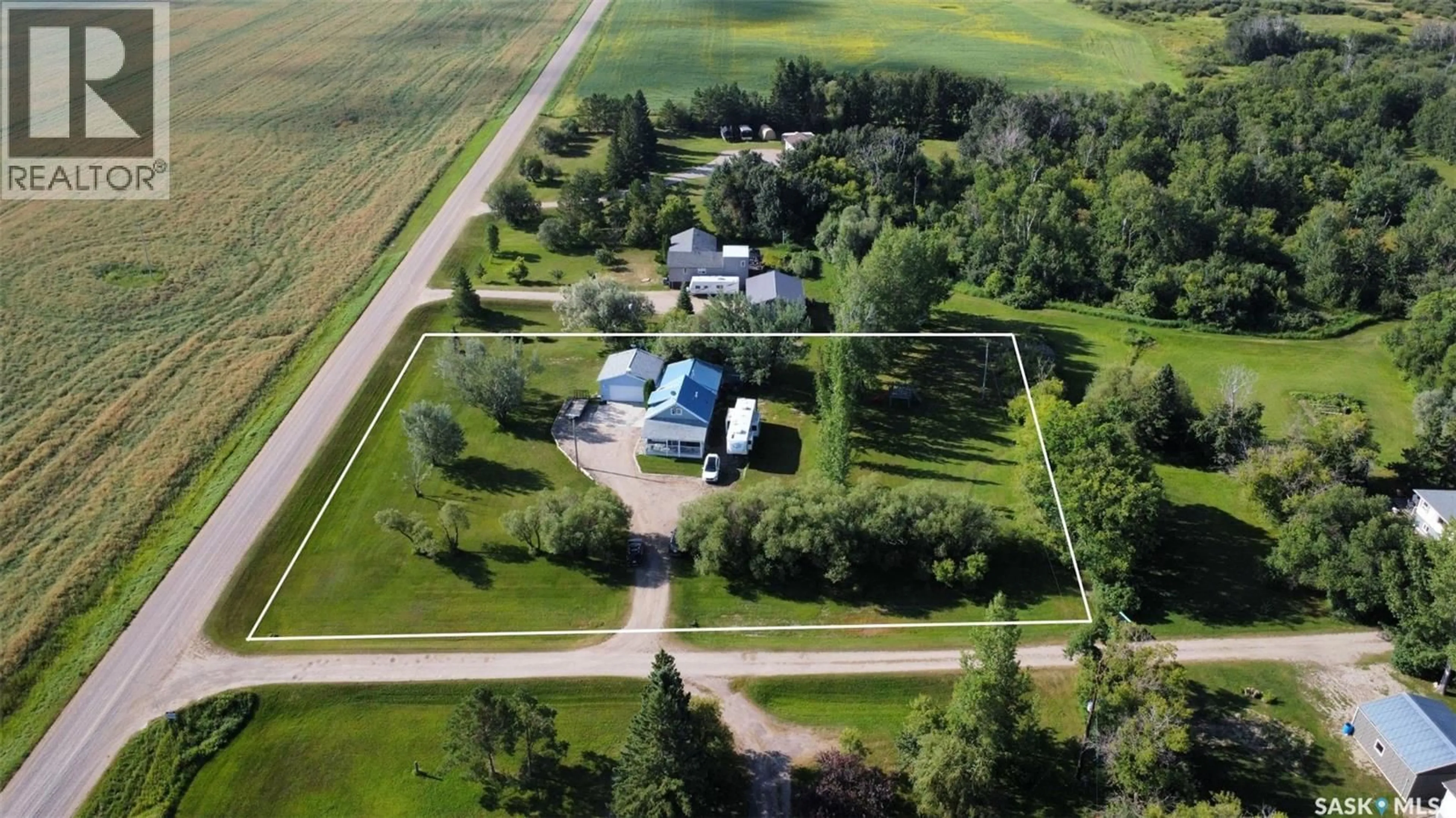 A pic from outside/outdoor area/front of a property/back of a property/a pic from drone, unknown for REID ACREAGE, Big Quill Rm No. 308 Saskatchewan S0A4T0