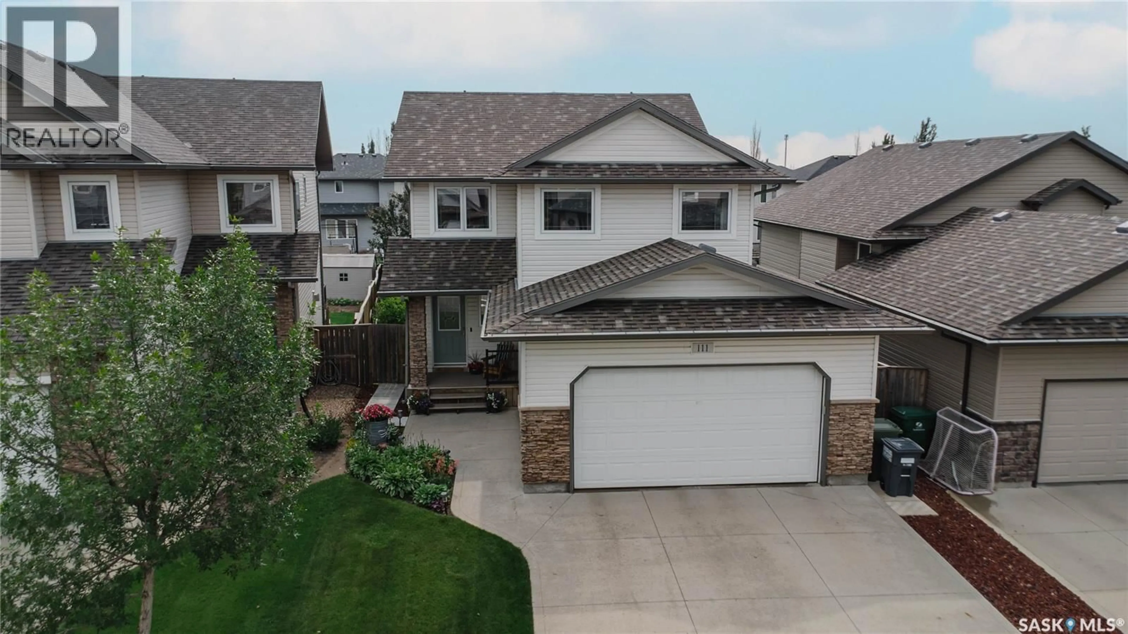 A pic from outside/outdoor area/front of a property/back of a property/a pic from drone, street for 111 HETTLE COVE, Saskatoon Saskatchewan S7T0E8