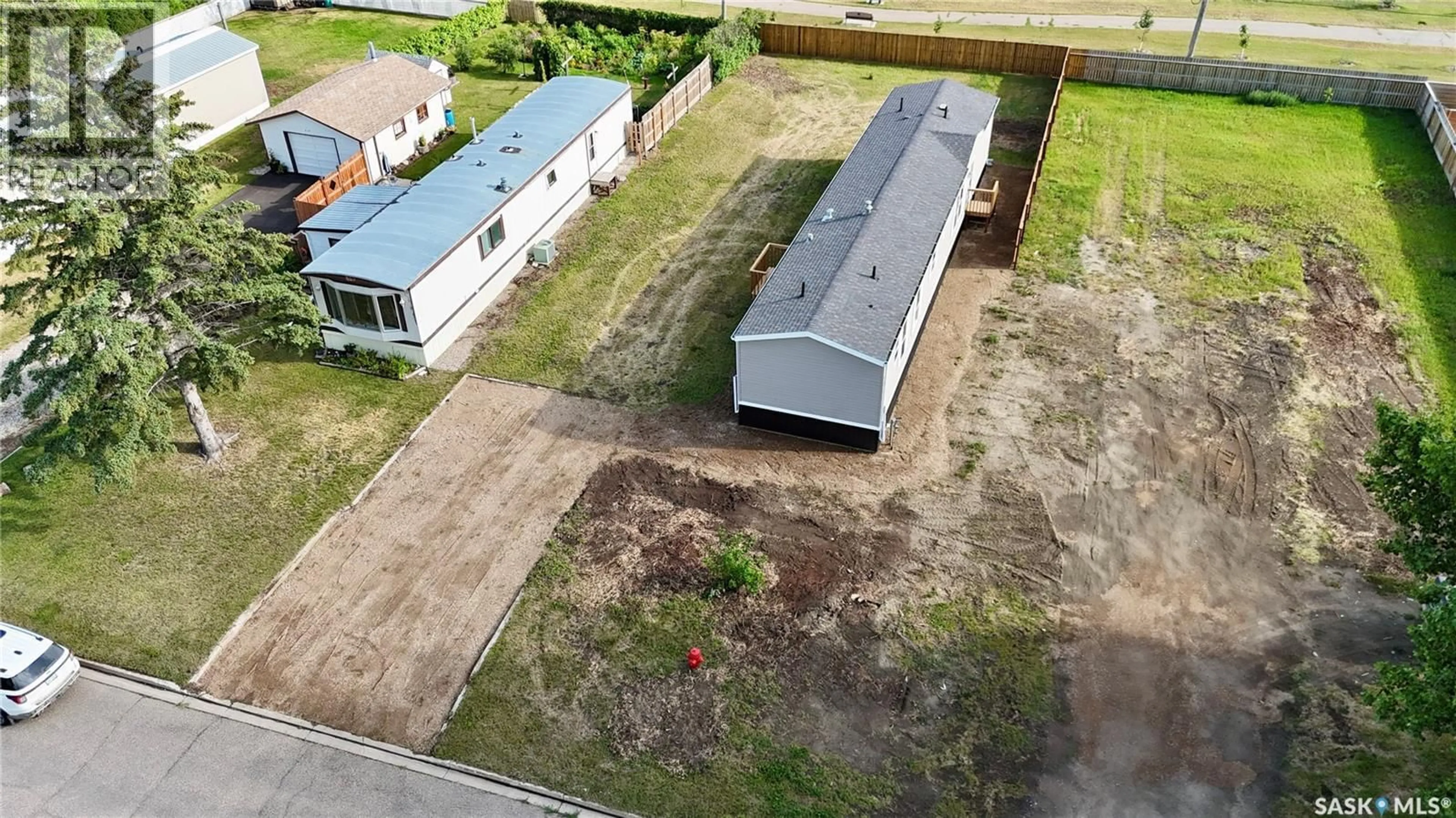 A pic from outside/outdoor area/front of a property/back of a property/a pic from drone, building for 431 PARK AVENUE, Outlook Saskatchewan S0L2N0