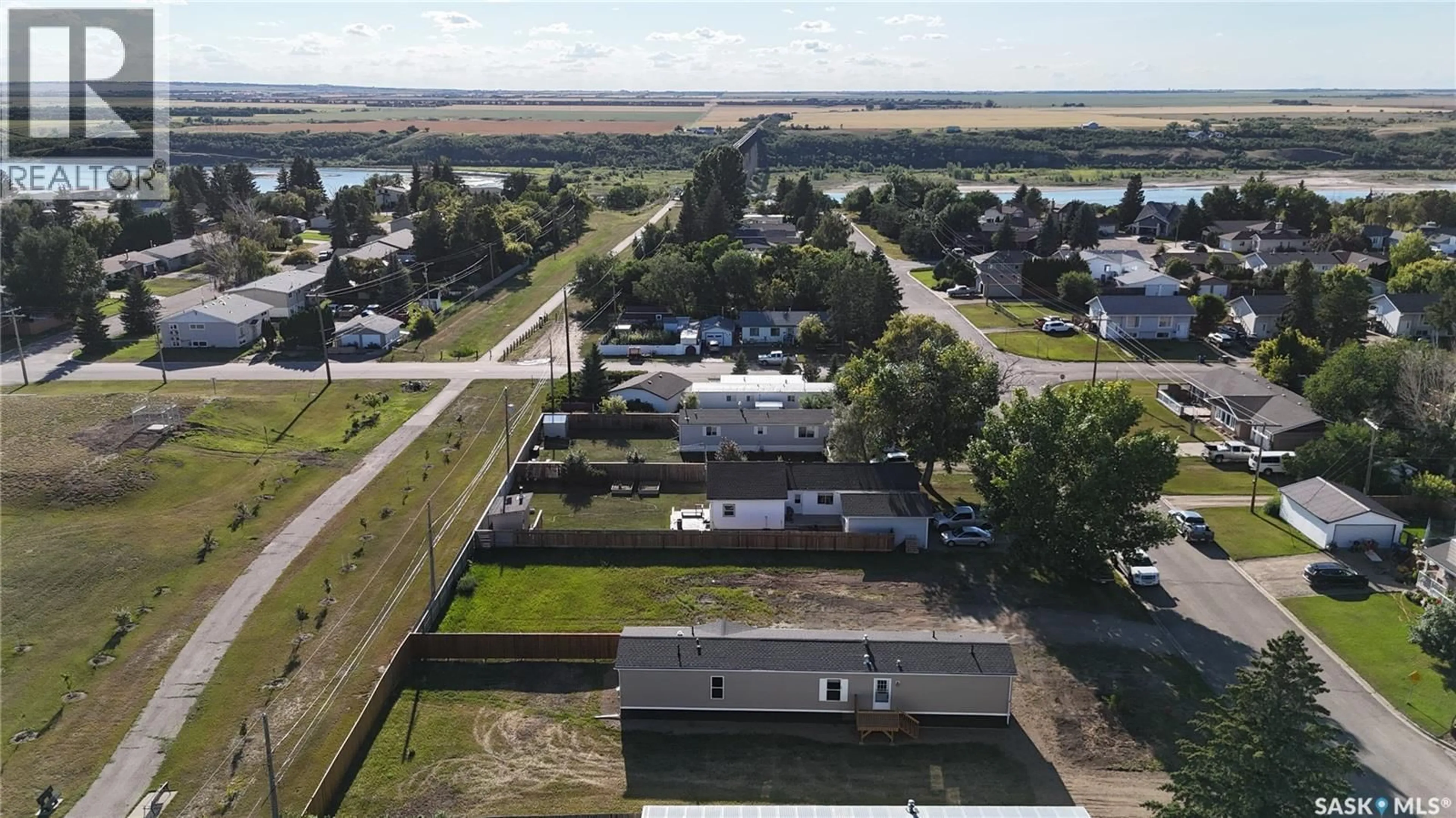 A pic from outside/outdoor area/front of a property/back of a property/a pic from drone, water/lake/river/ocean view for 431 PARK AVENUE, Outlook Saskatchewan S0L2N0