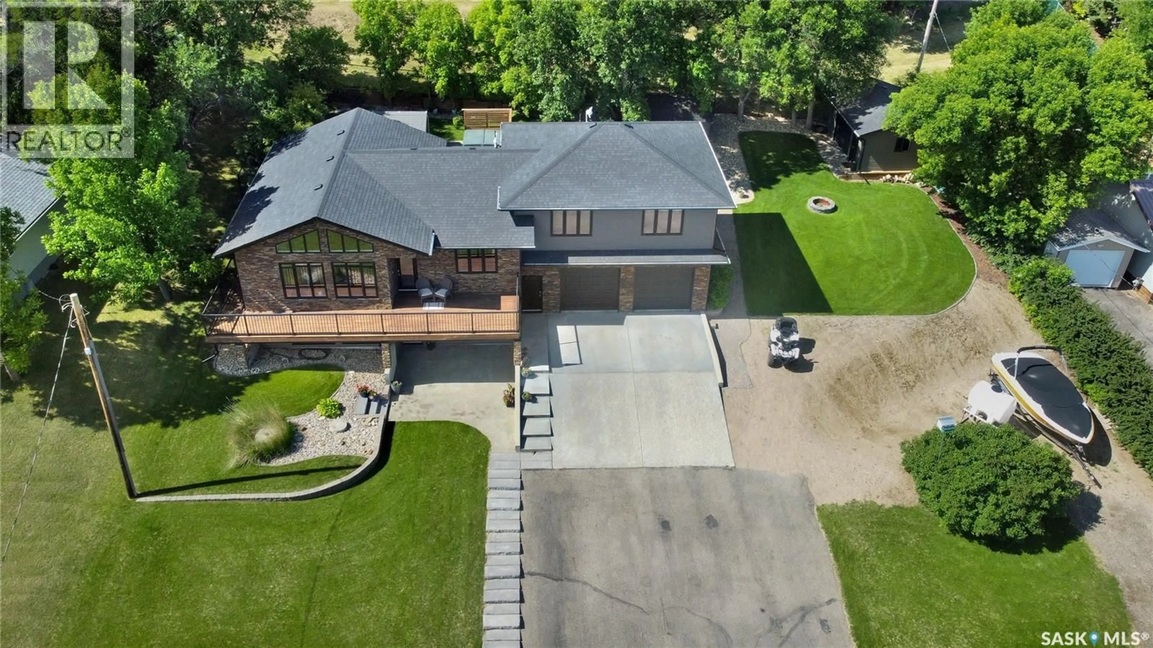 A pic from outside/outdoor area/front of a property/back of a property/a pic from drone, street for 507 TATANKA DRIVE, Buffalo Pound Lake Saskatchewan S0H0S0