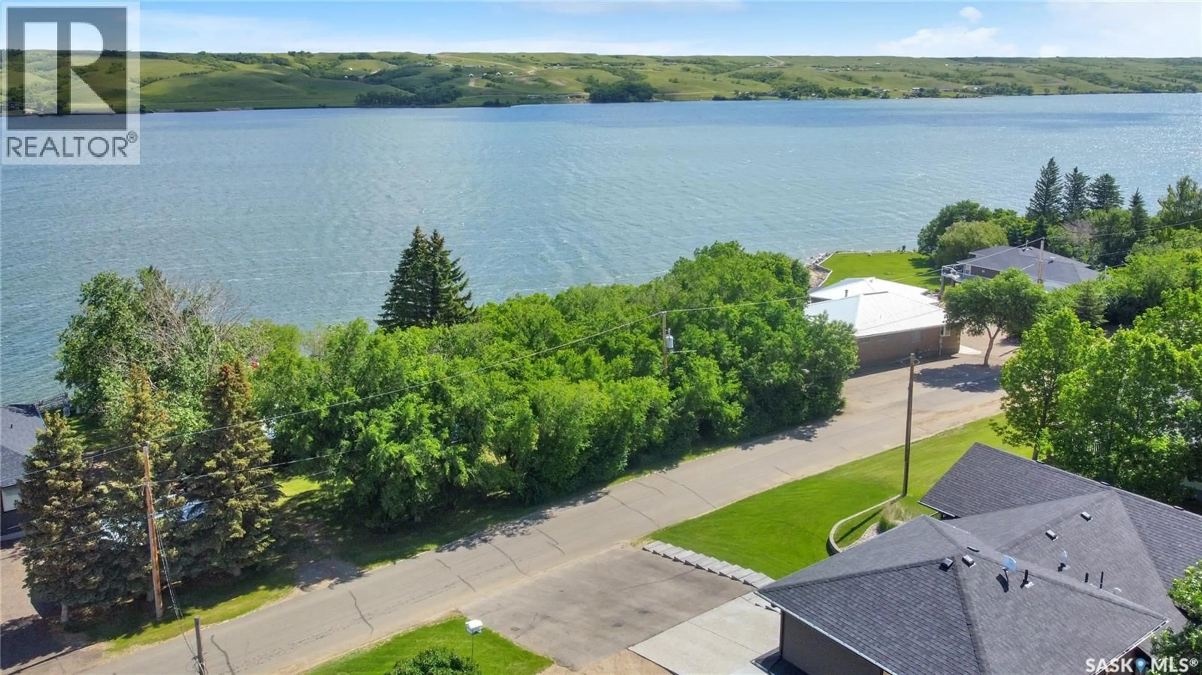 A pic from outside/outdoor area/front of a property/back of a property/a pic from drone, water/lake/river/ocean view for 507 TATANKA DRIVE, Buffalo Pound Lake Saskatchewan S0H0S0