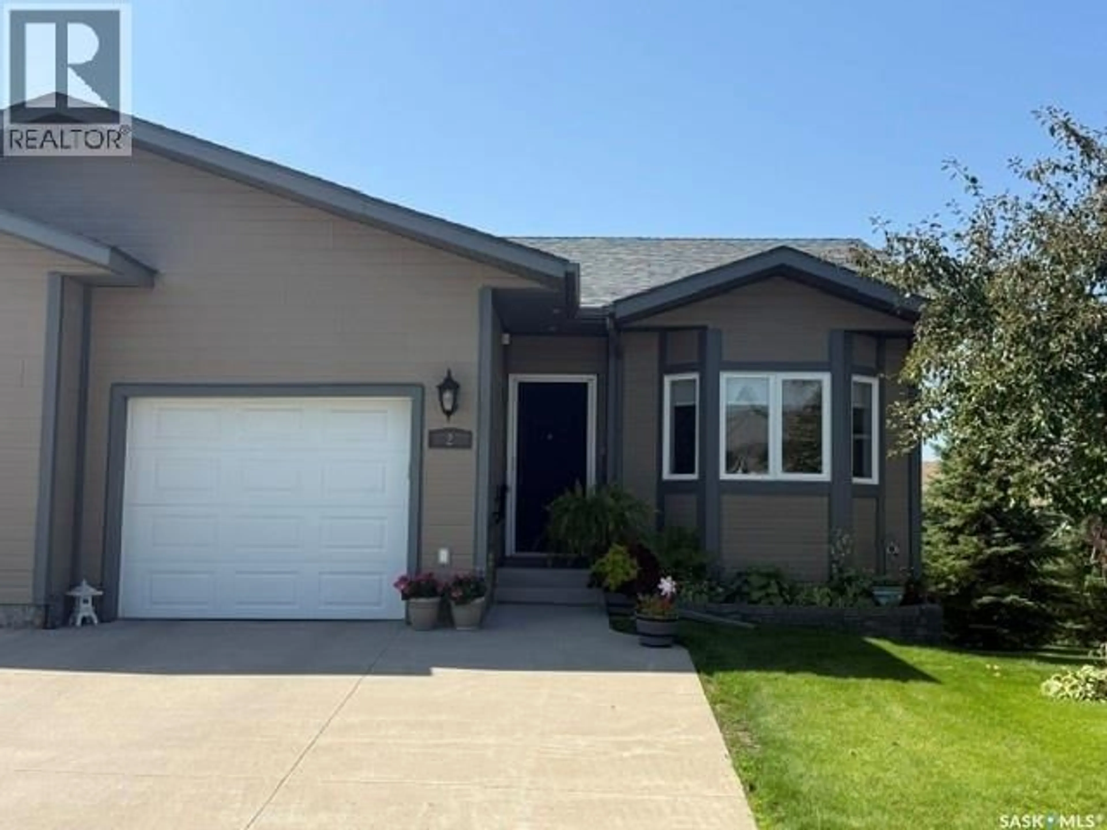 Home with vinyl exterior material, street for 2 - 550 SOUTHWOOD DRIVE, Prince Albert Saskatchewan S6V1G4