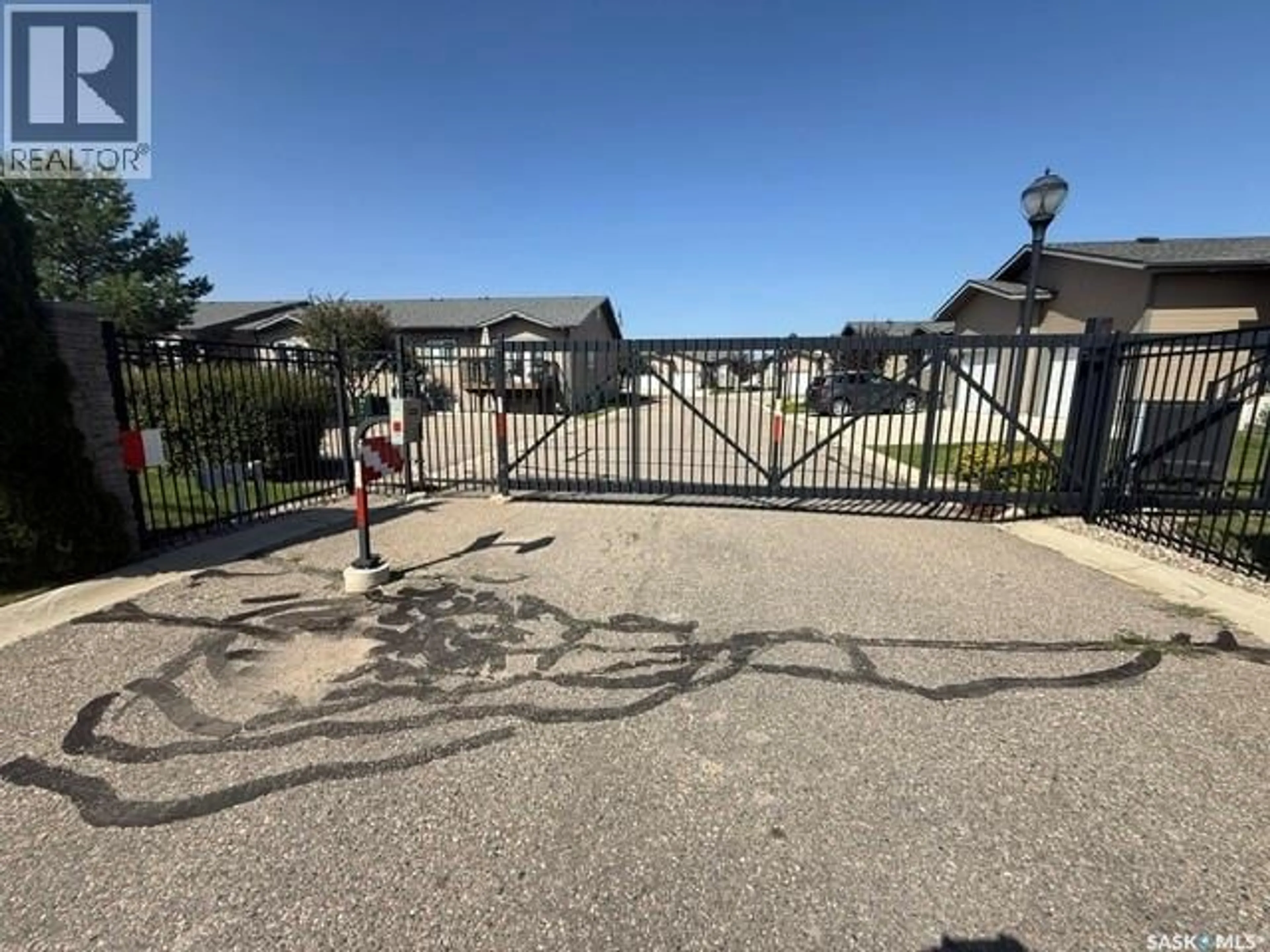 A pic from outside/outdoor area/front of a property/back of a property/a pic from drone, street for 2 - 550 SOUTHWOOD DRIVE, Prince Albert Saskatchewan S6V1G4