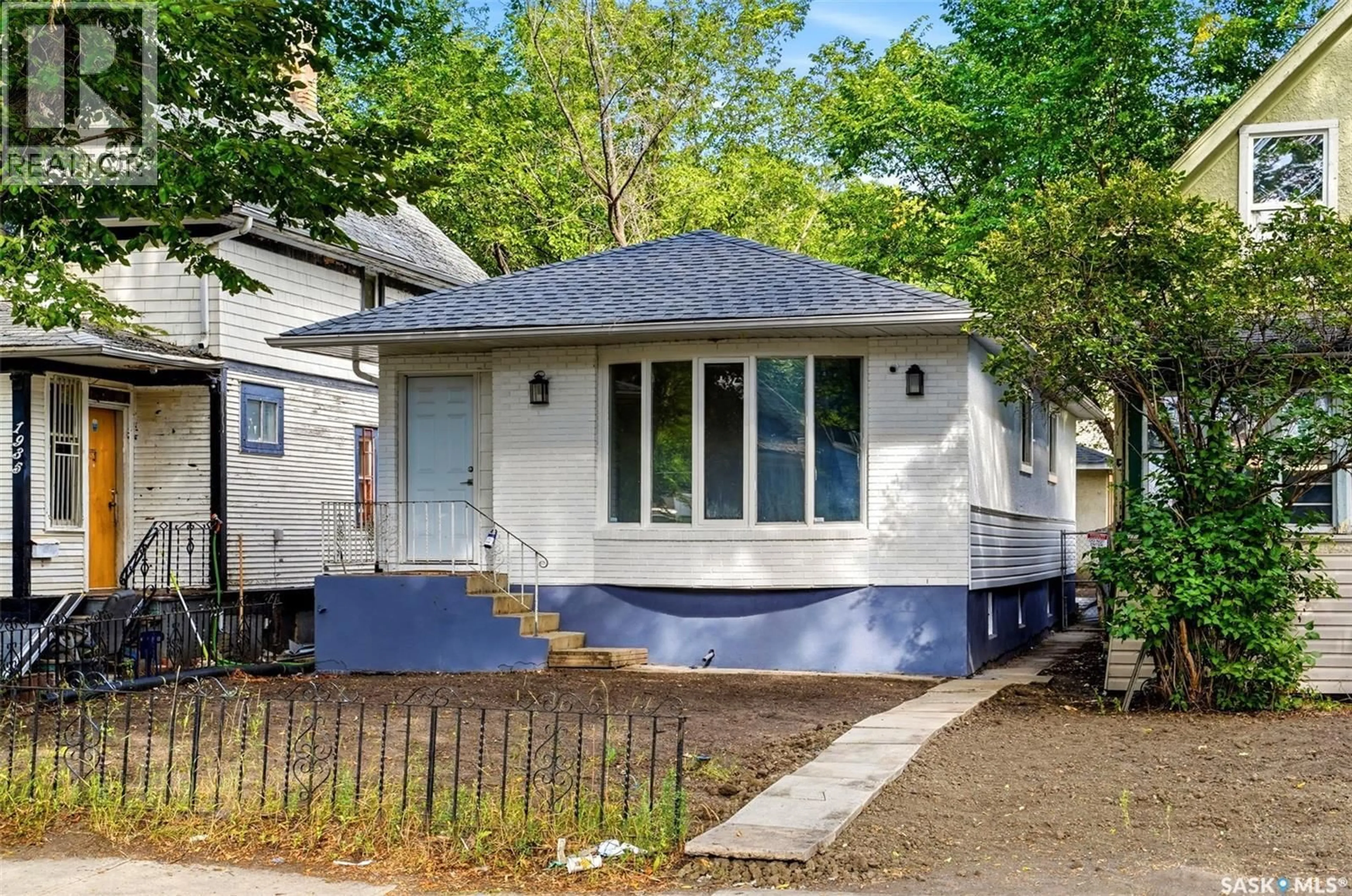 Home with vinyl exterior material, street for 1937 MONTREAL STREET, Regina Saskatchewan S4P1L4