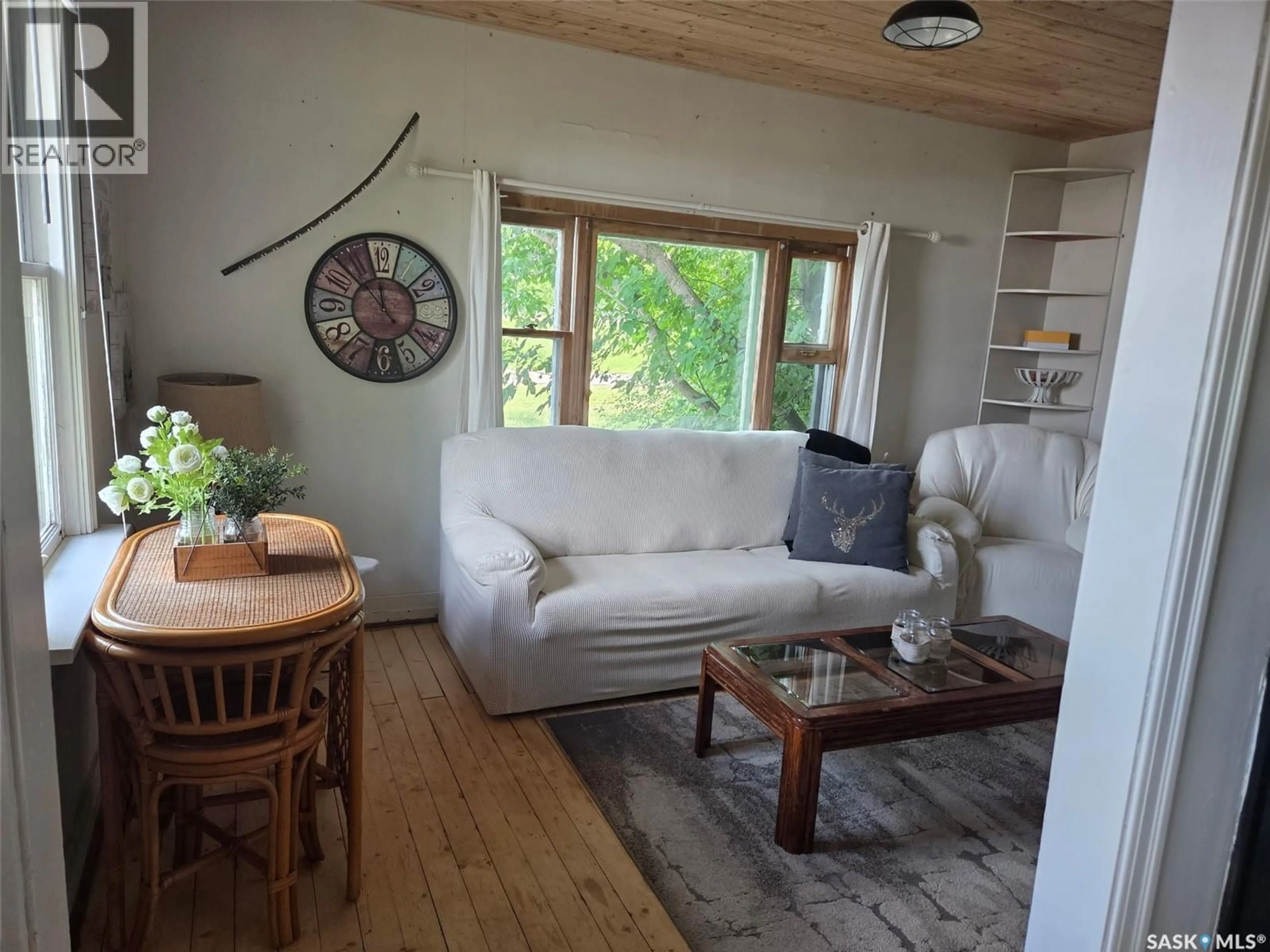 Living room with furniture, wood/laminate floor for 315 RAILWAY AVENUE, White Fox Saskatchewan S0J3B0