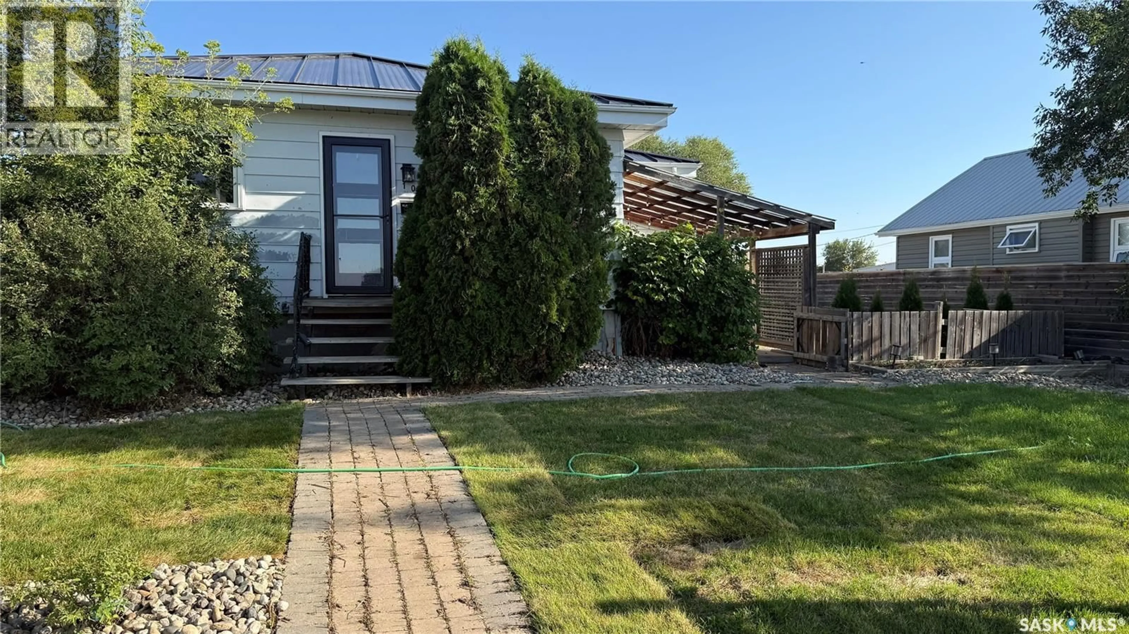 A pic from outside/outdoor area/front of a property/back of a property/a pic from drone, street for 108 FRONT STREET, Pense Saskatchewan S0G3W0