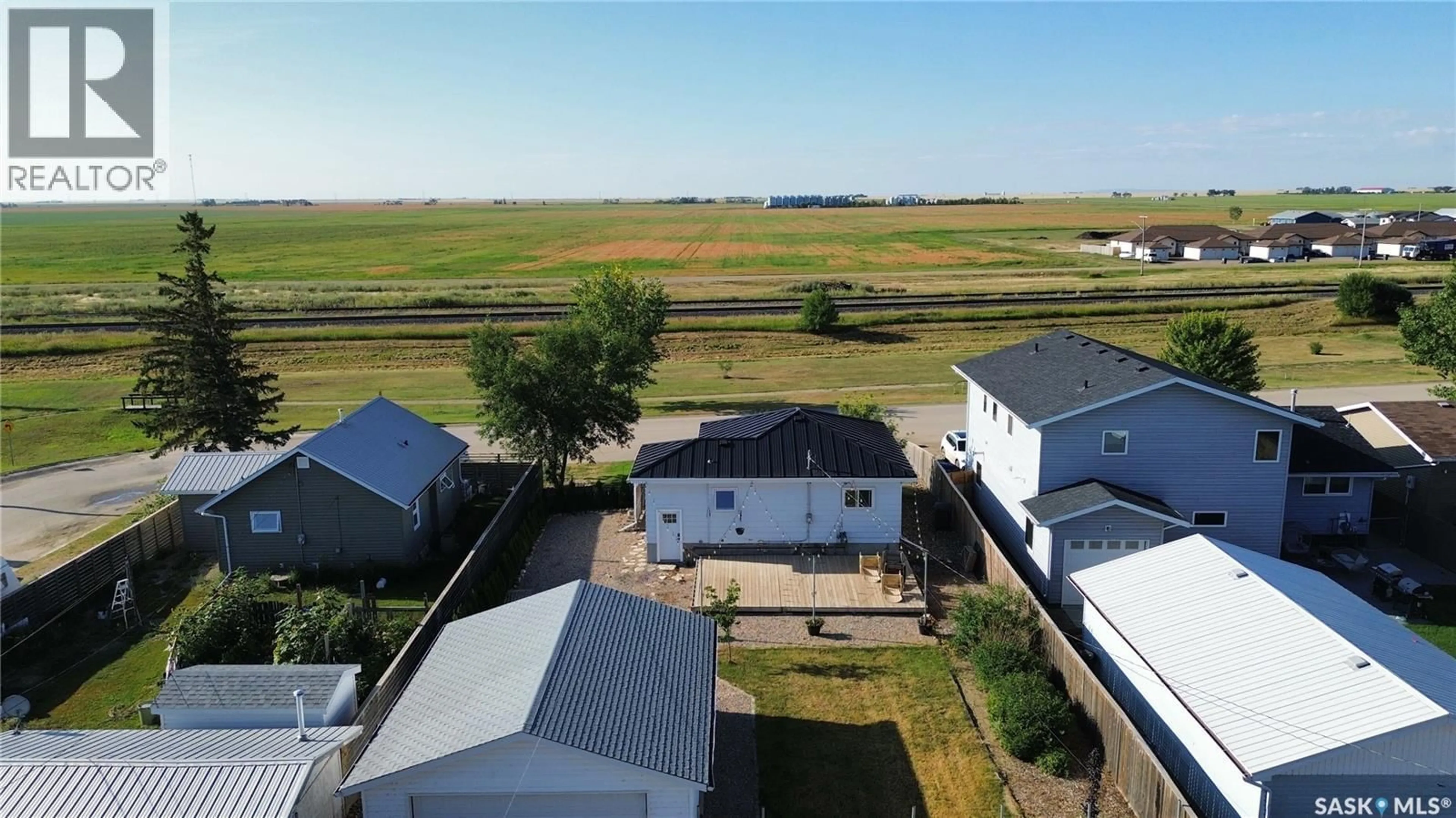 A pic from outside/outdoor area/front of a property/back of a property/a pic from drone, unknown for 108 FRONT STREET, Pense Saskatchewan S0G3W0
